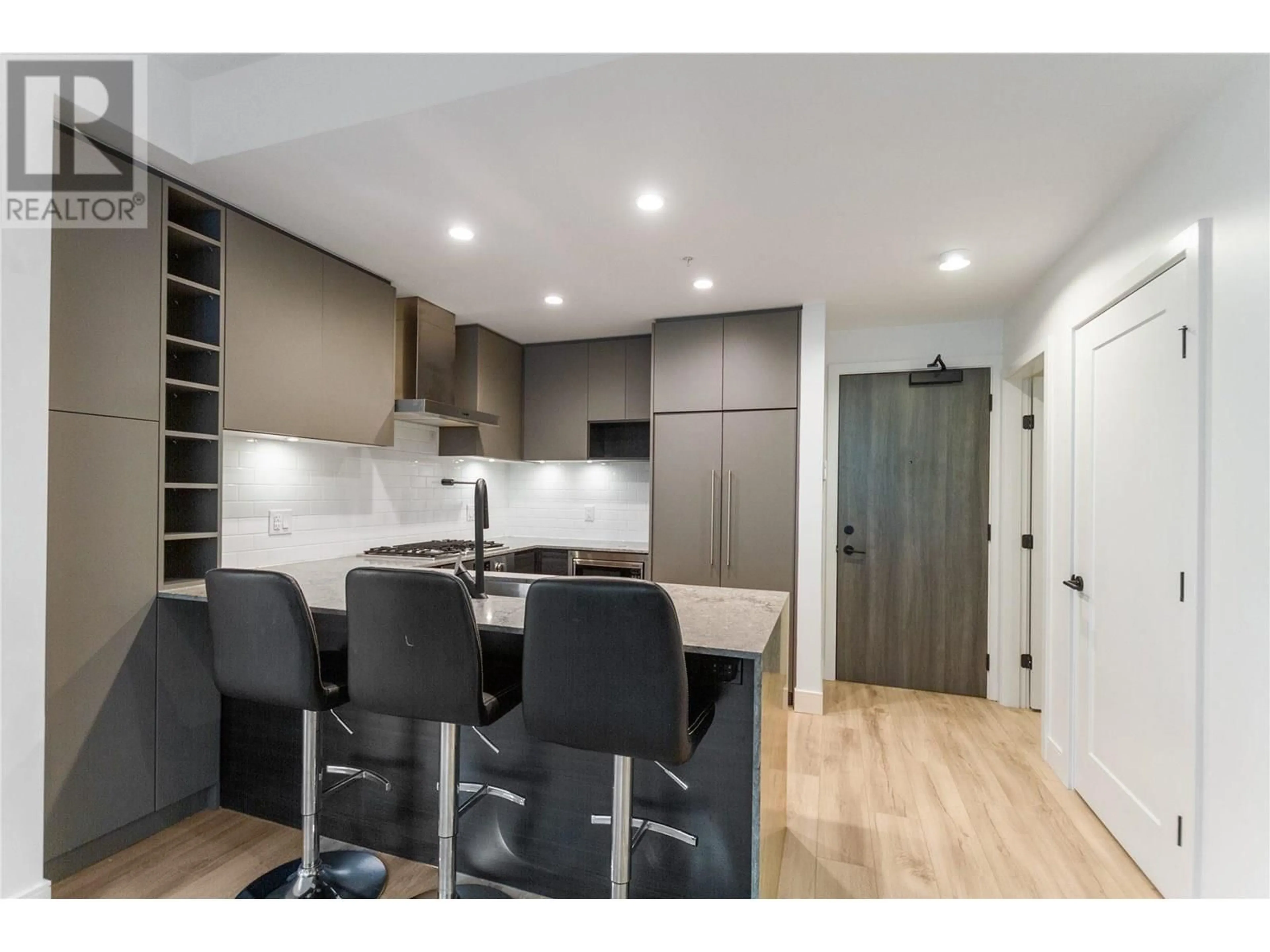 Open concept kitchen, wood/laminate floor for 202 - 3131 MURRAY STREET, Port Moody British Columbia V3H0L9