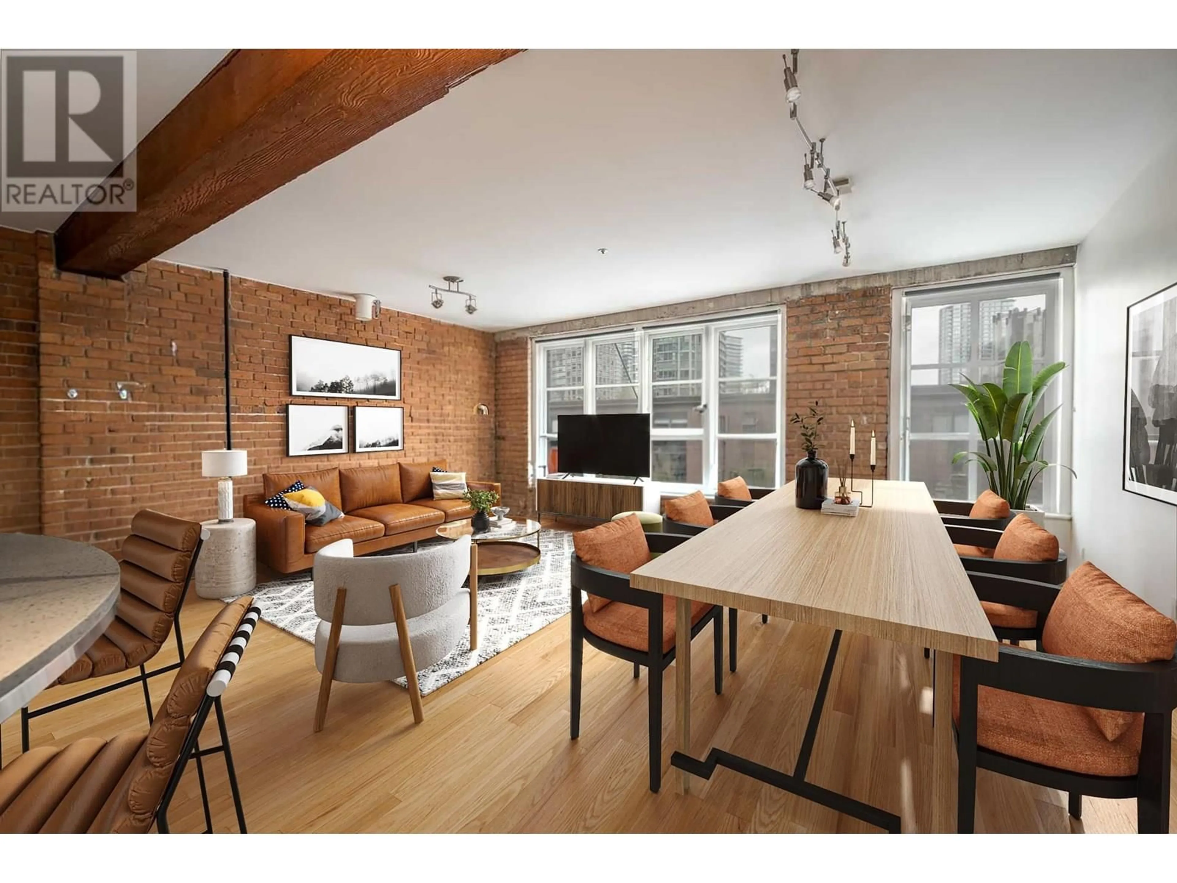 Living room with furniture, wood/laminate floor for 205 - 1066 HAMILTON STREET, Vancouver British Columbia V6B2R9
