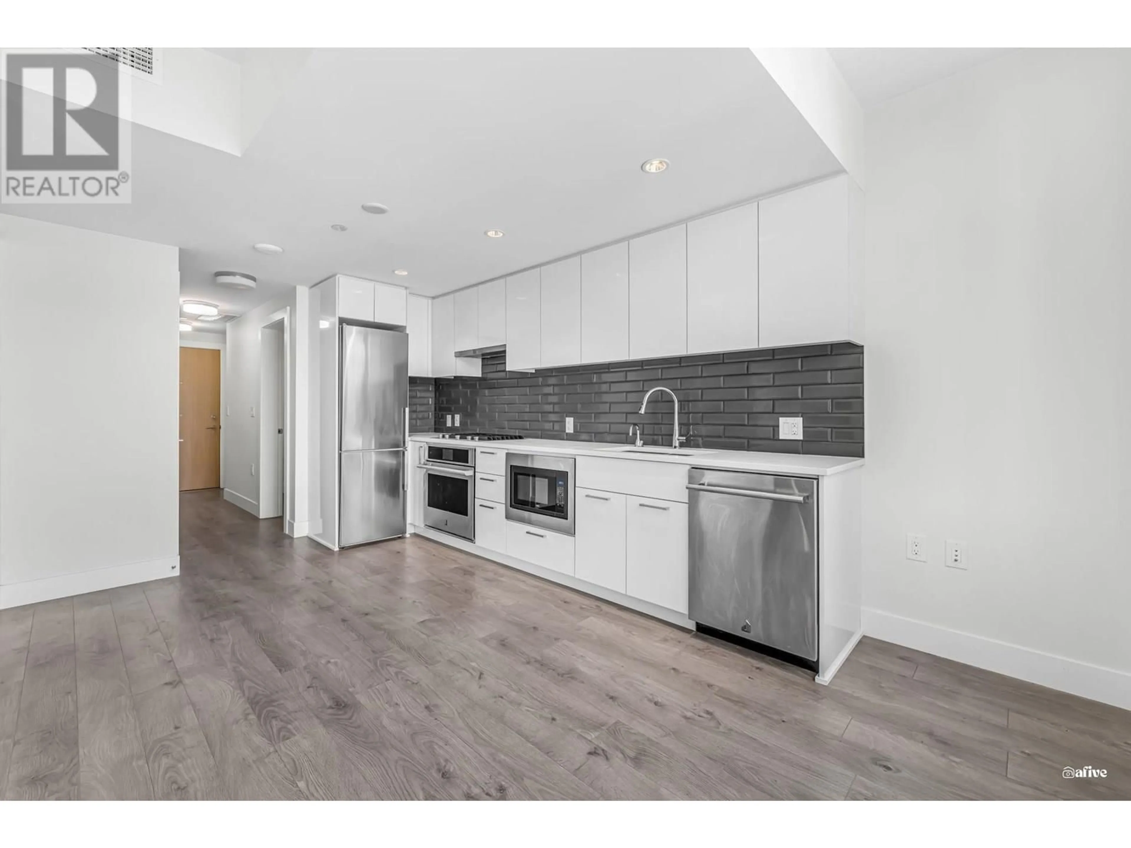 Open concept kitchen, unknown for 614 - 3451 SAWMILL CRESCENT, Vancouver British Columbia V5S0H1