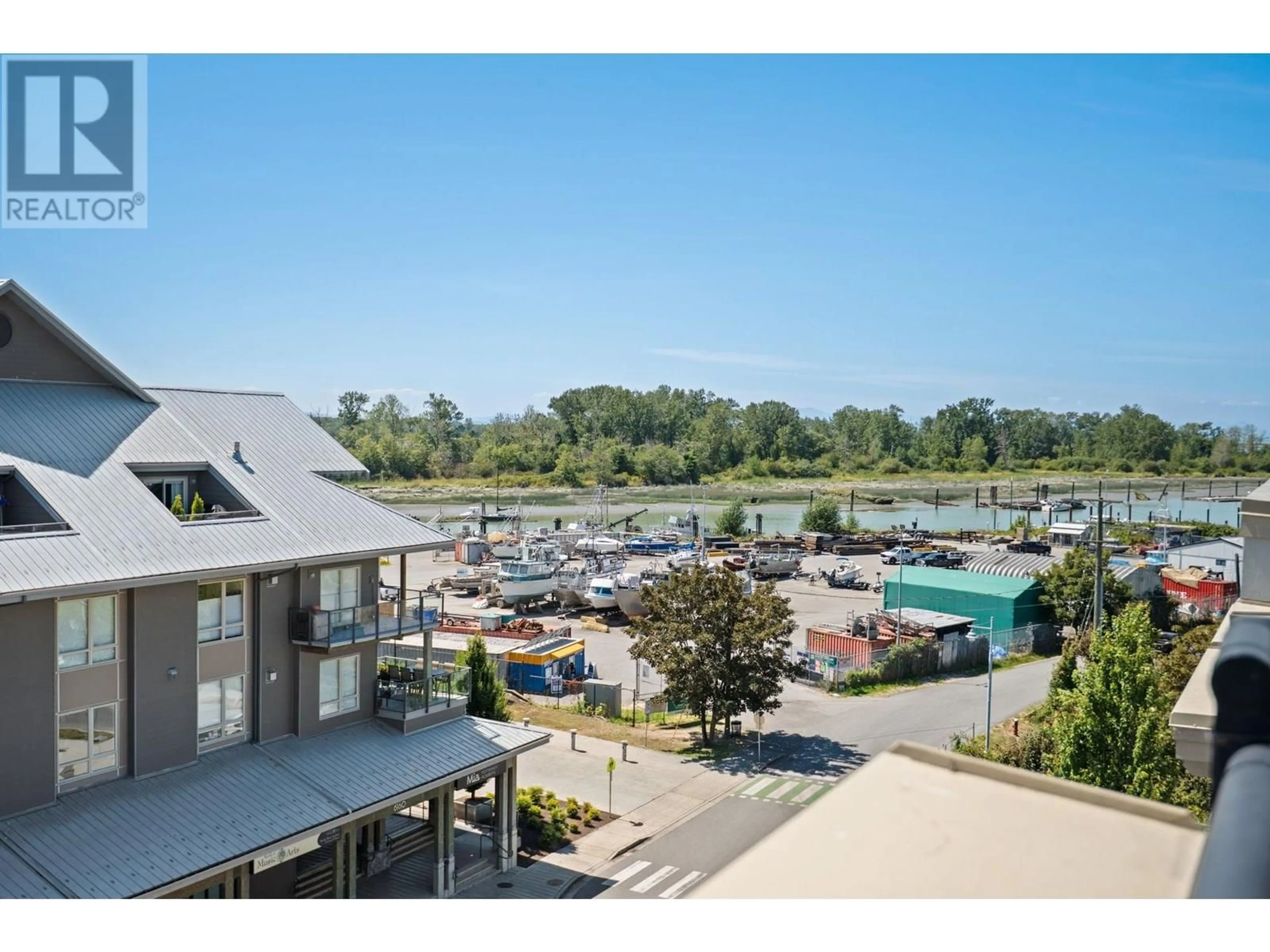 A pic from outside/outdoor area/front of a property/back of a property/a pic from drone, water/lake/river/ocean view for 303 - 6077 LONDON ROAD, Richmond British Columbia V7E0A7