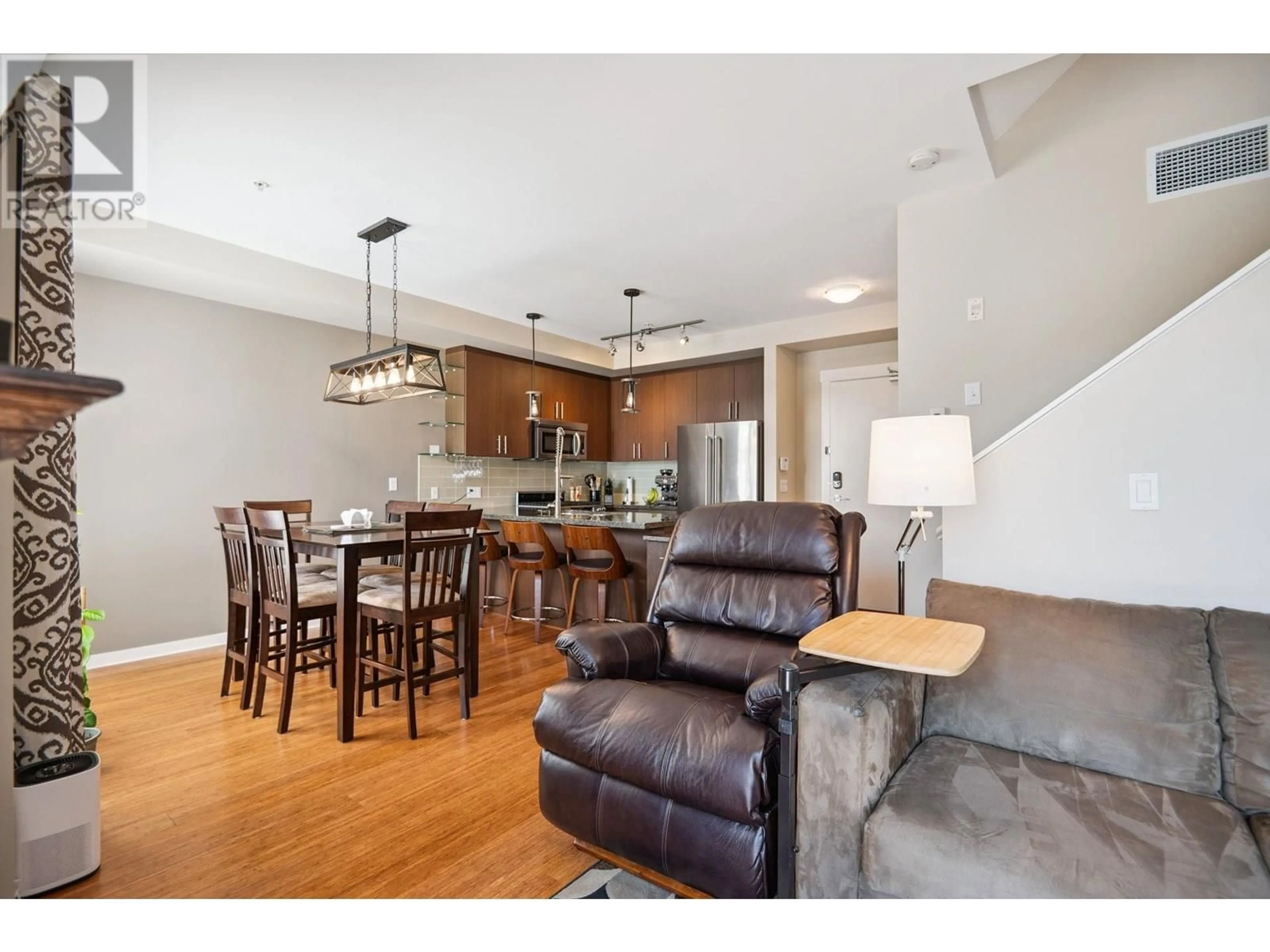 Open concept kitchen, wood/laminate floor for 303 - 6077 LONDON ROAD, Richmond British Columbia V7E0A7