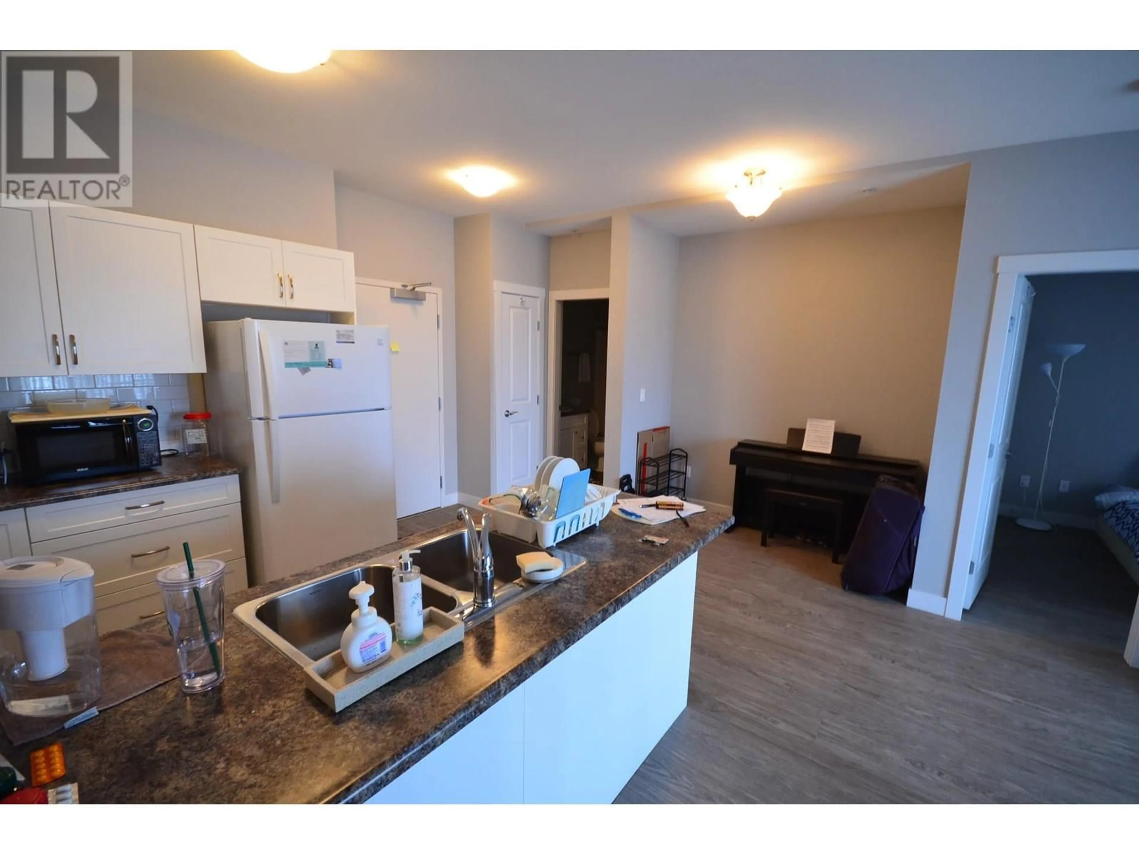 Open concept kitchen, unknown for 406 - 10307 112 STREET, Fort St. John British Columbia V1N0N6