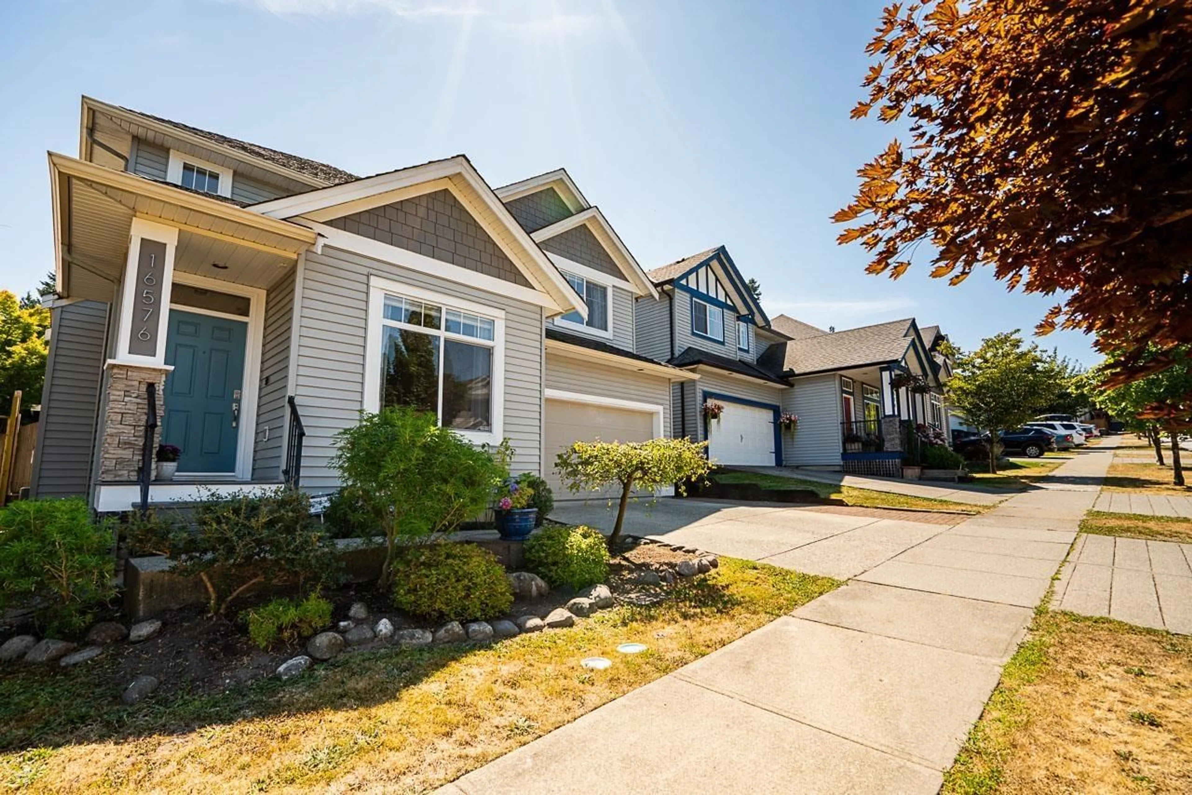 Home with vinyl exterior material, street for 16576 59A, Surrey British Columbia V3S4N9