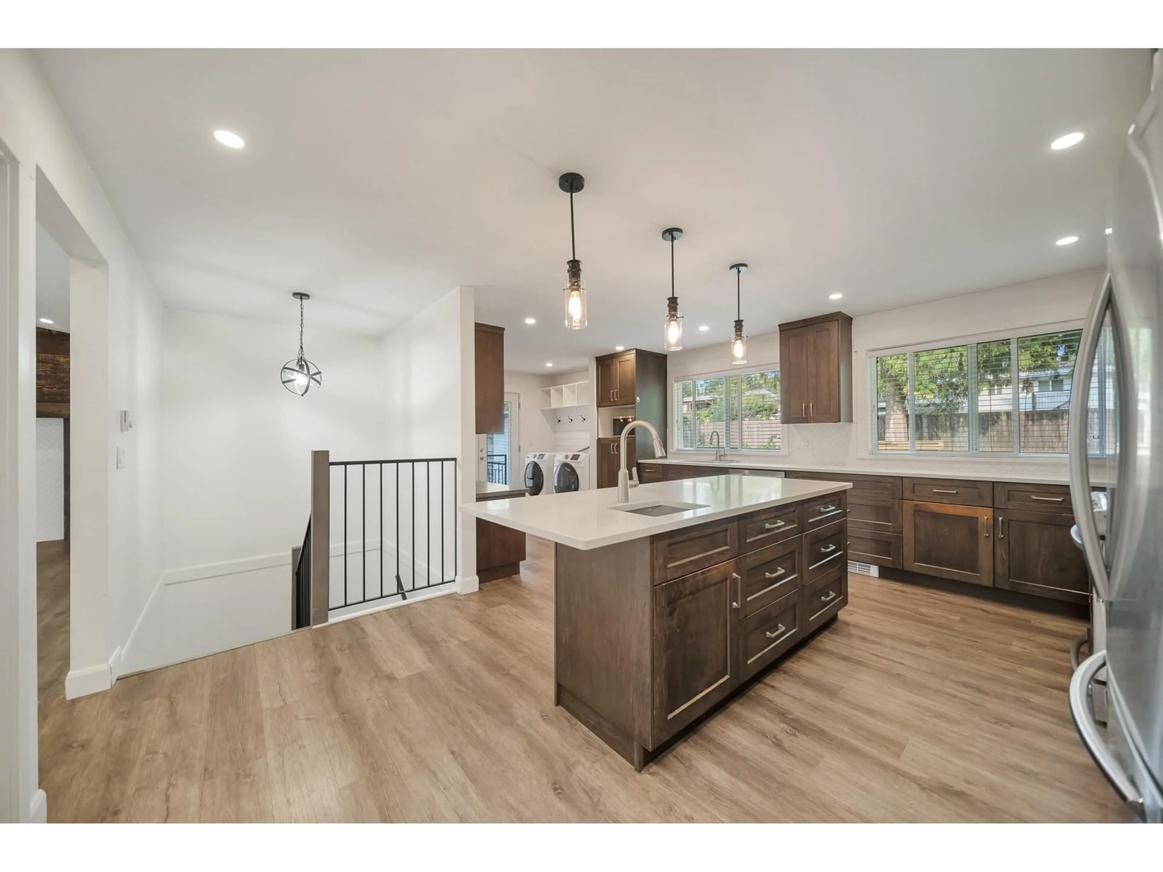 Open concept kitchen, wood/laminate floor for 2152 MAYWOOD, Abbotsford British Columbia V2S4Z1
