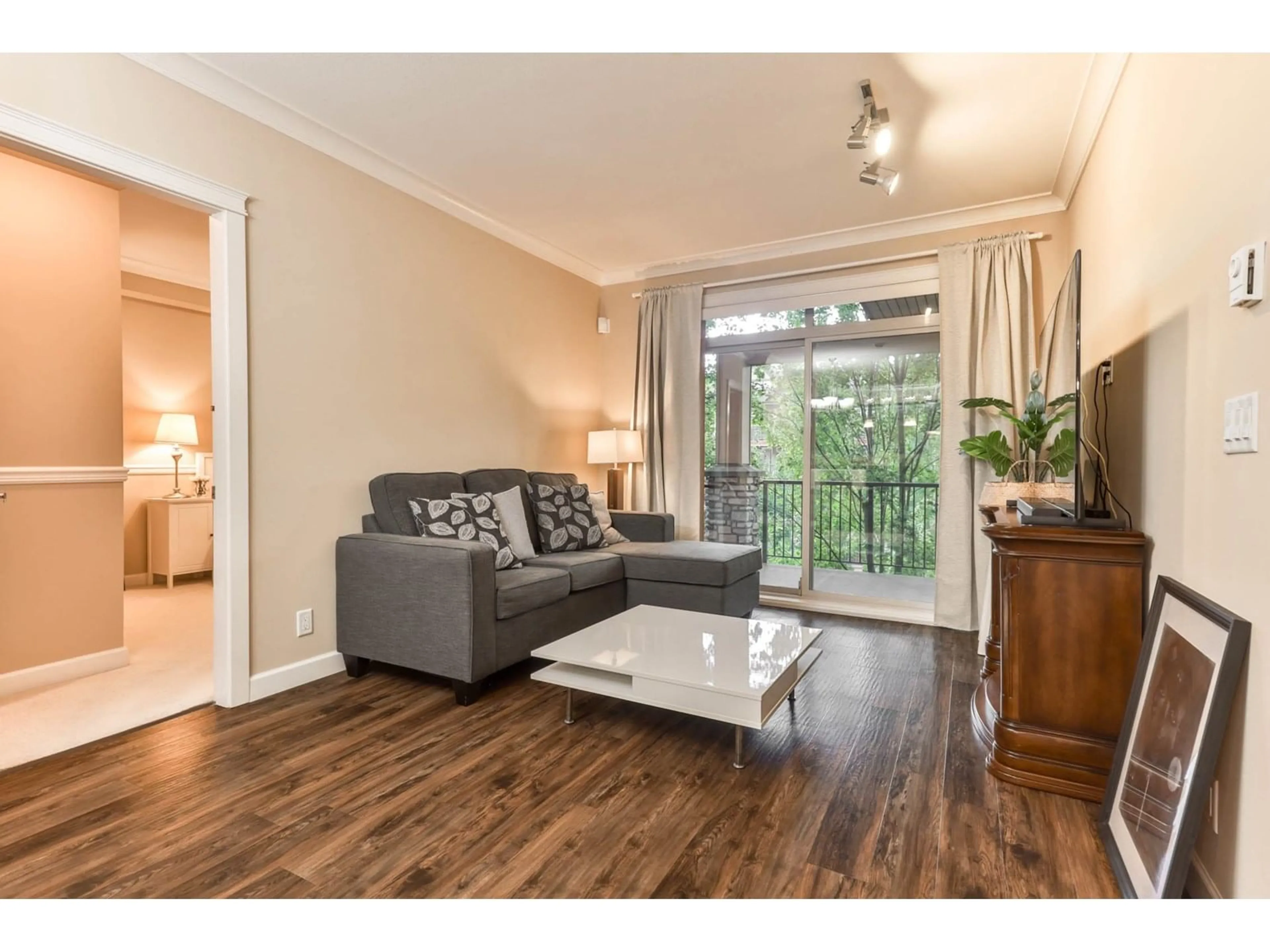Living room with furniture, wood/laminate floor for 454 - 8328 207A, Langley British Columbia V2Y0K5