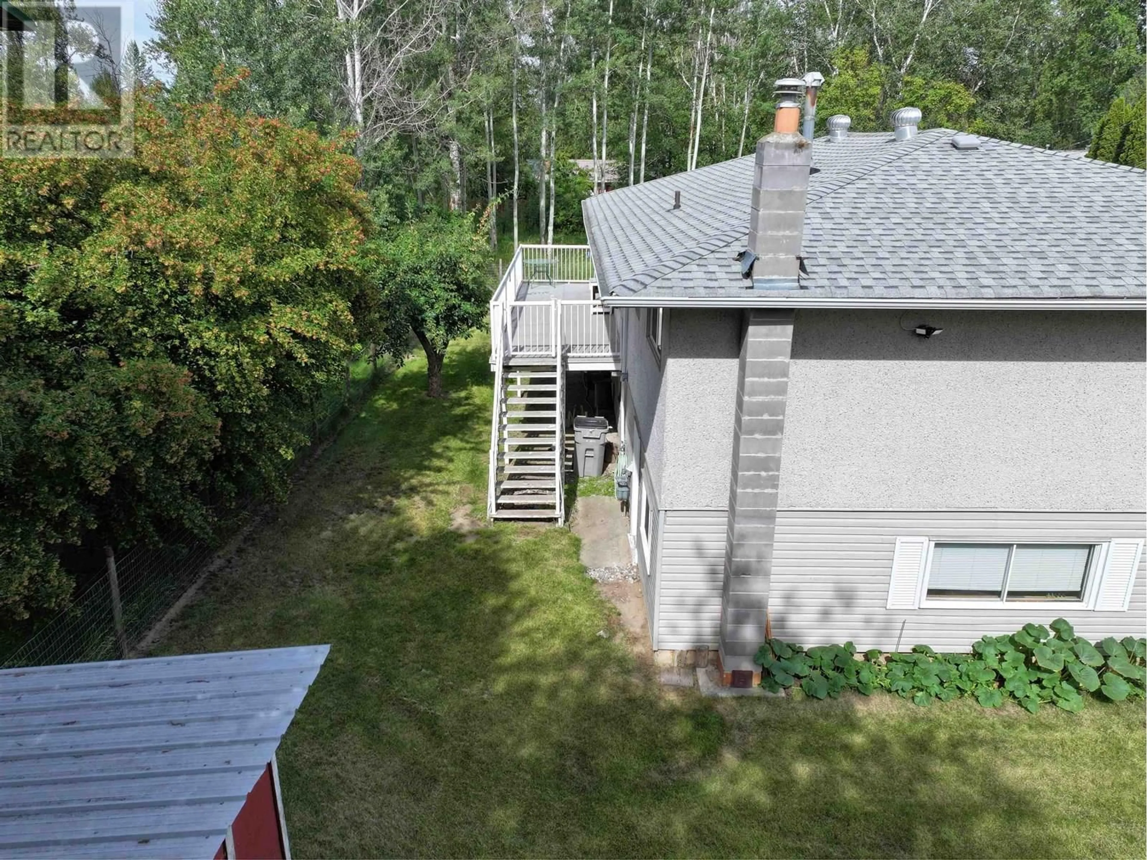 A pic from outside/outdoor area/front of a property/back of a property/a pic from drone, water/lake/river/ocean view for 257 WARDEN STREET, Quesnel British Columbia V2J1C4