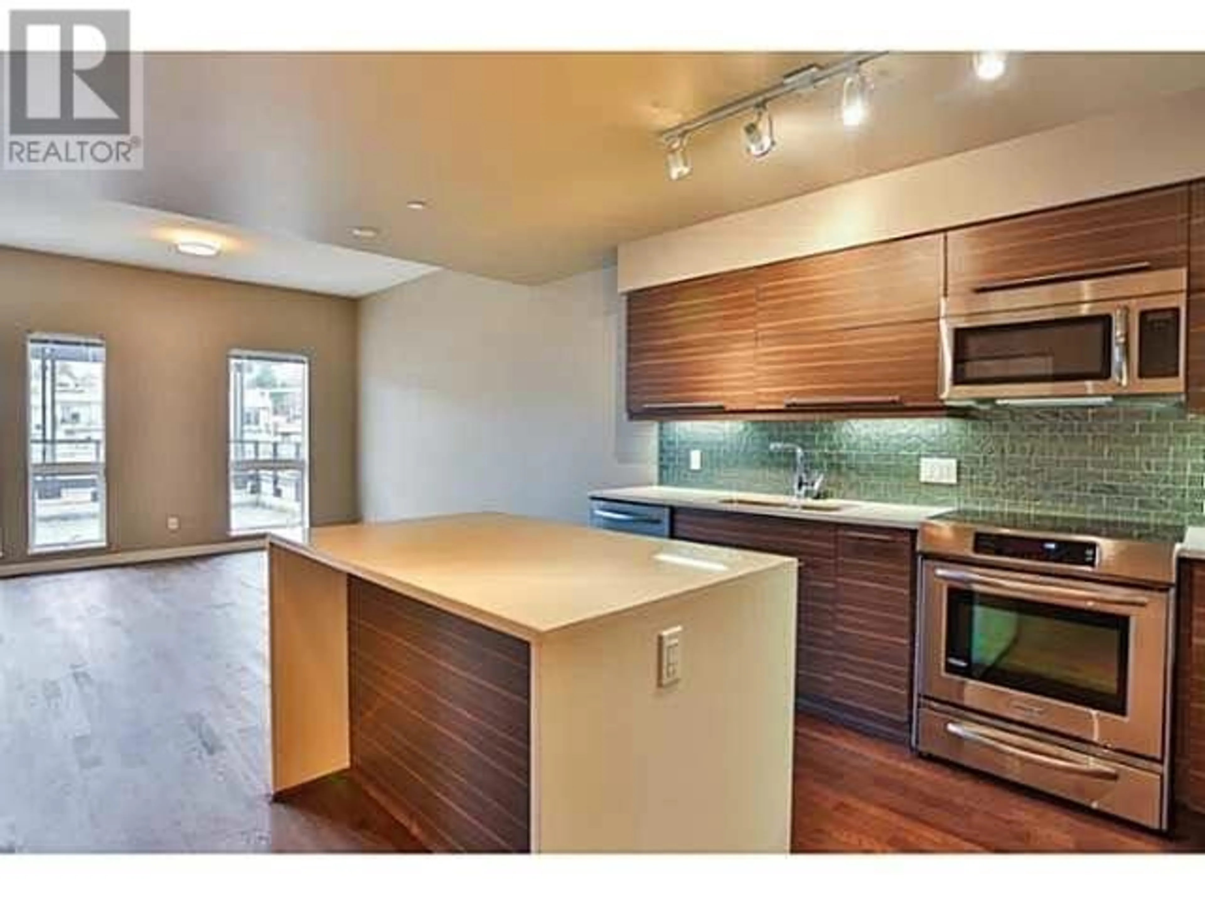 Open concept kitchen, wood/laminate floor for 313 - 317 BEWICKE AVENUE, North Vancouver British Columbia V7M3E9