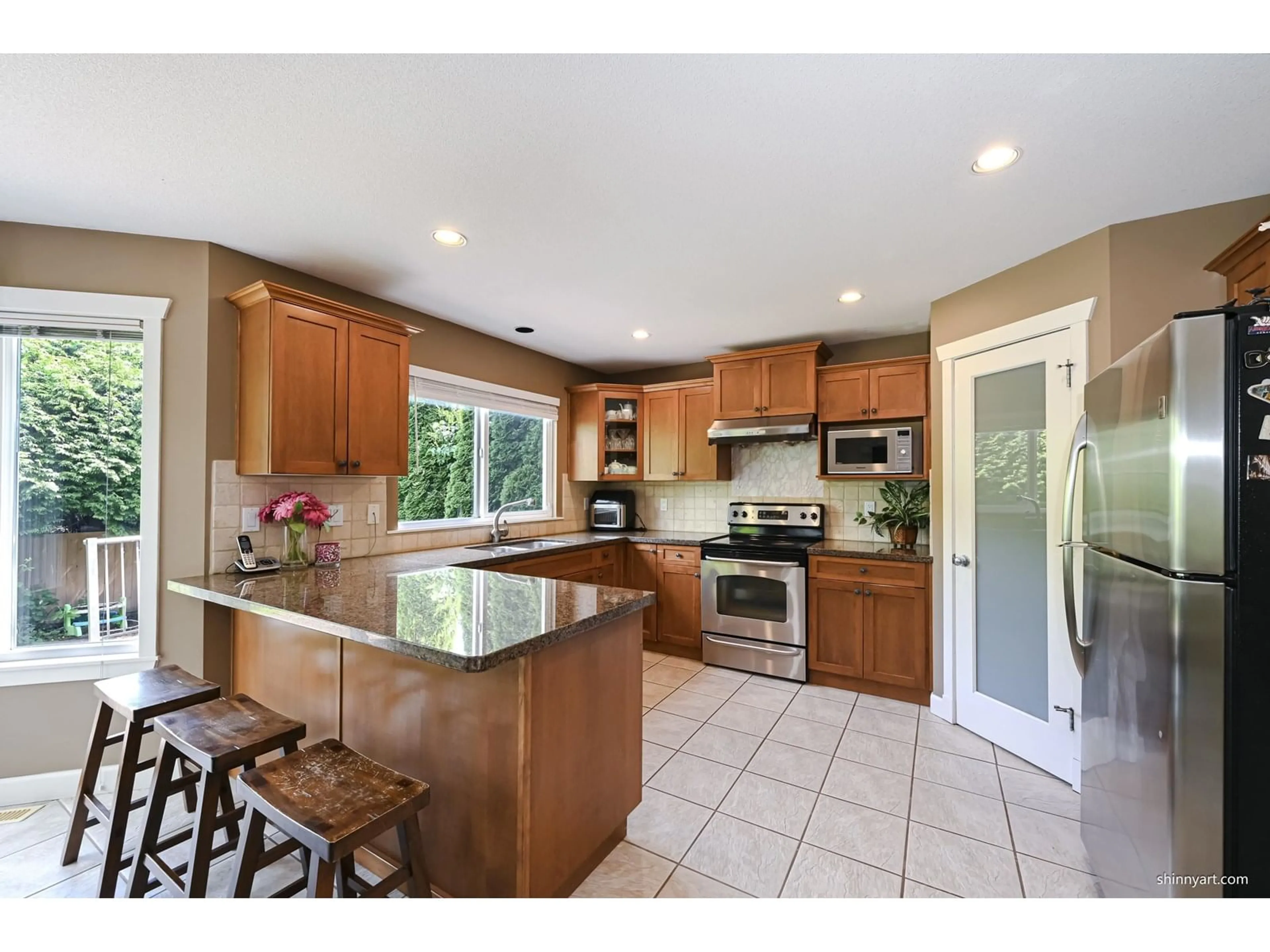 Open concept kitchen, ceramic/tile floor for 6640 206, Langley British Columbia V2Y2Y5