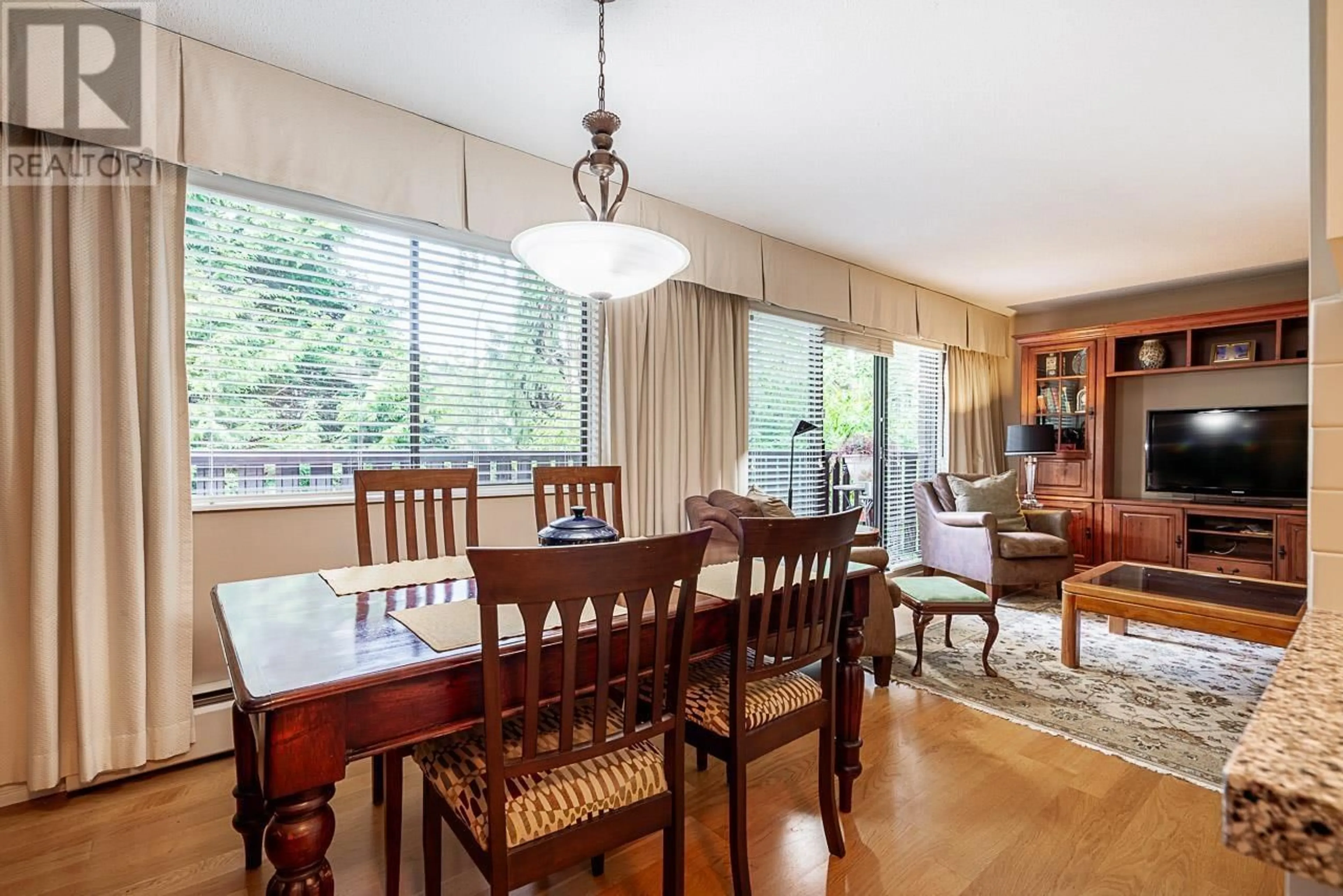 Dining room, wood/laminate floor for 211 - 175 4TH STREET, North Vancouver British Columbia V7L1H8