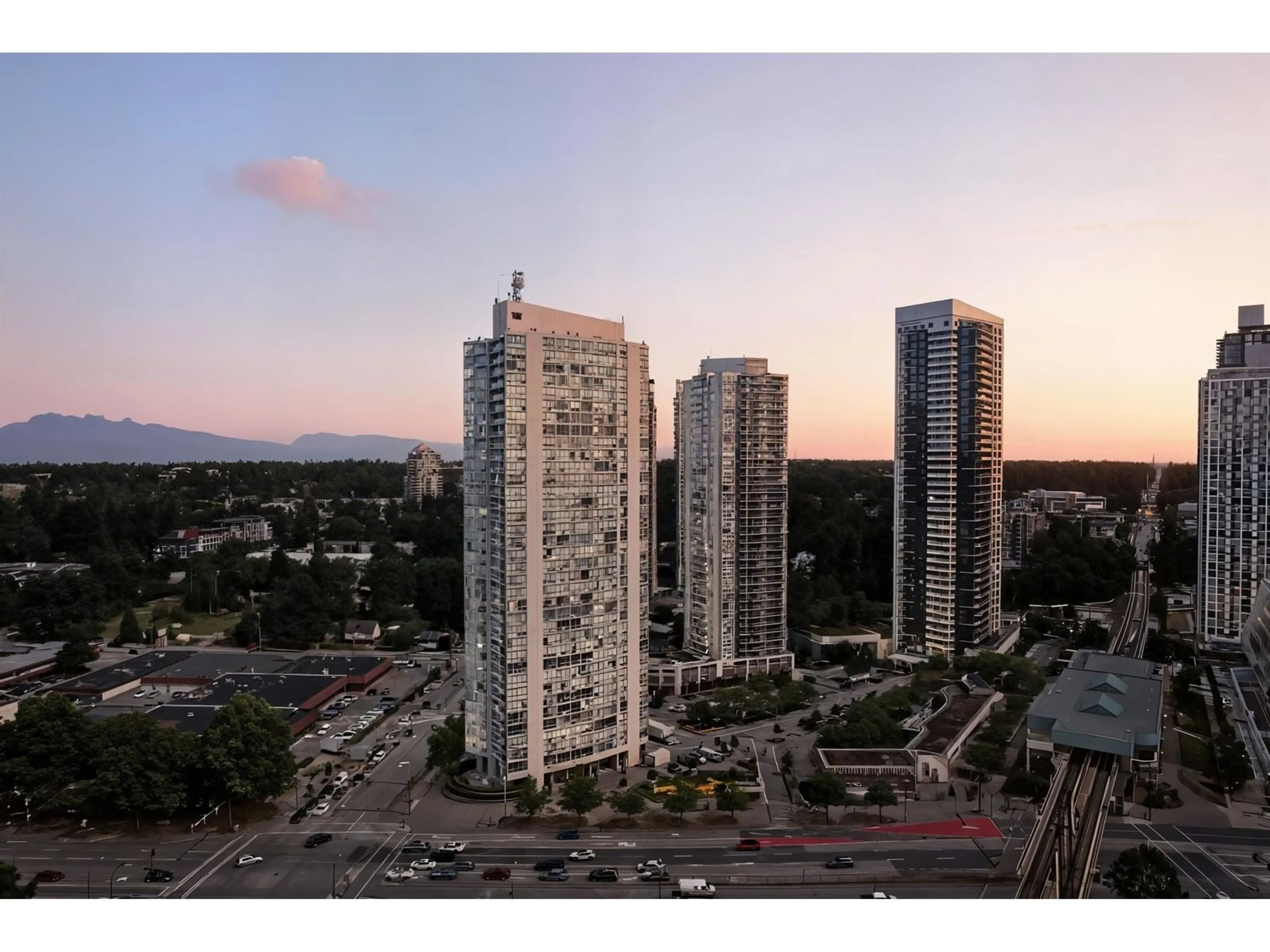 A pic from outside/outdoor area/front of a property/back of a property/a pic from drone, city buildings view from balcony for 1001 - 13618 100, Surrey British Columbia V3T0A8