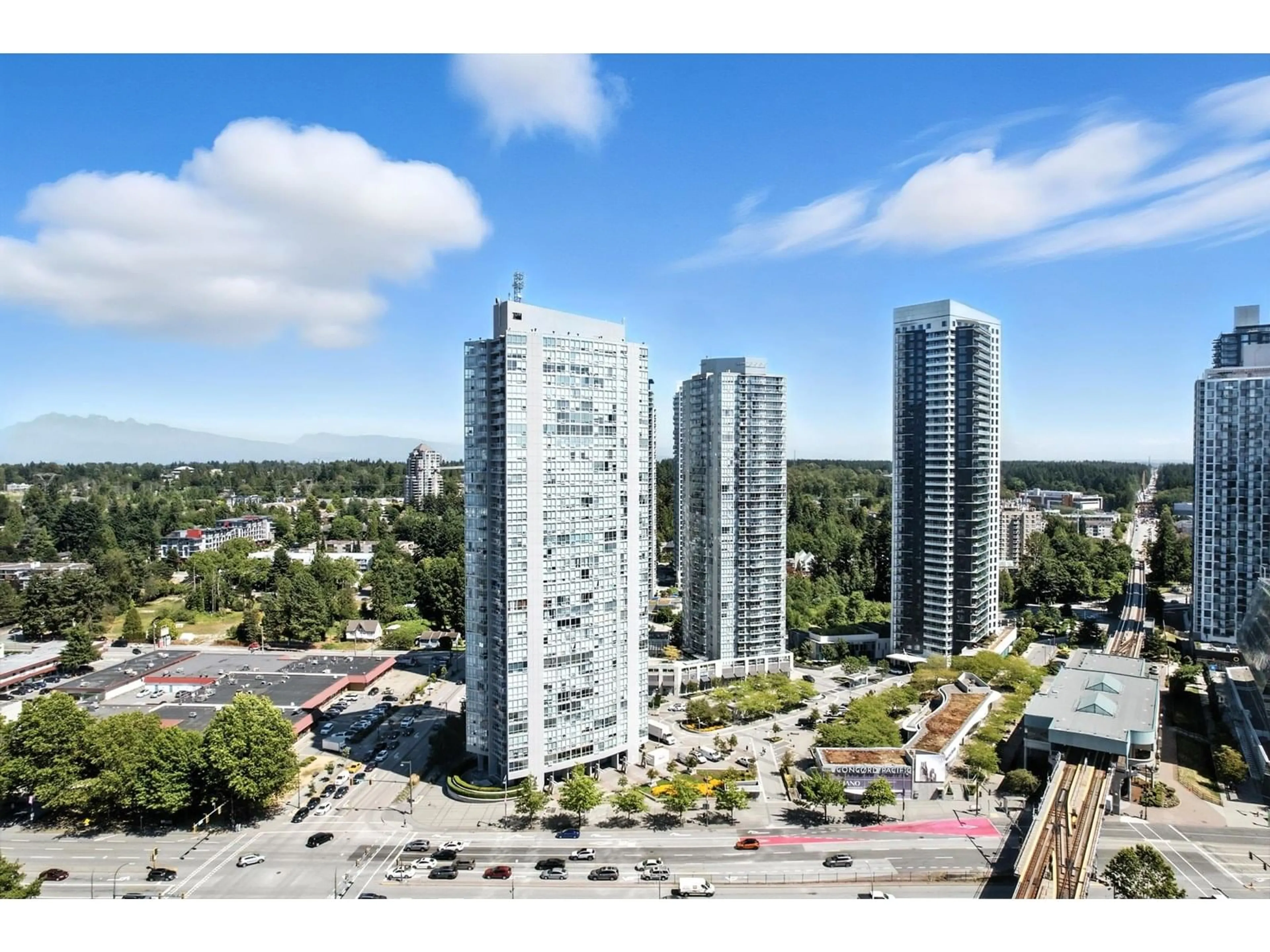 A pic from outside/outdoor area/front of a property/back of a property/a pic from drone, city buildings view from balcony for 1001 - 13618 100, Surrey British Columbia V3T0A8