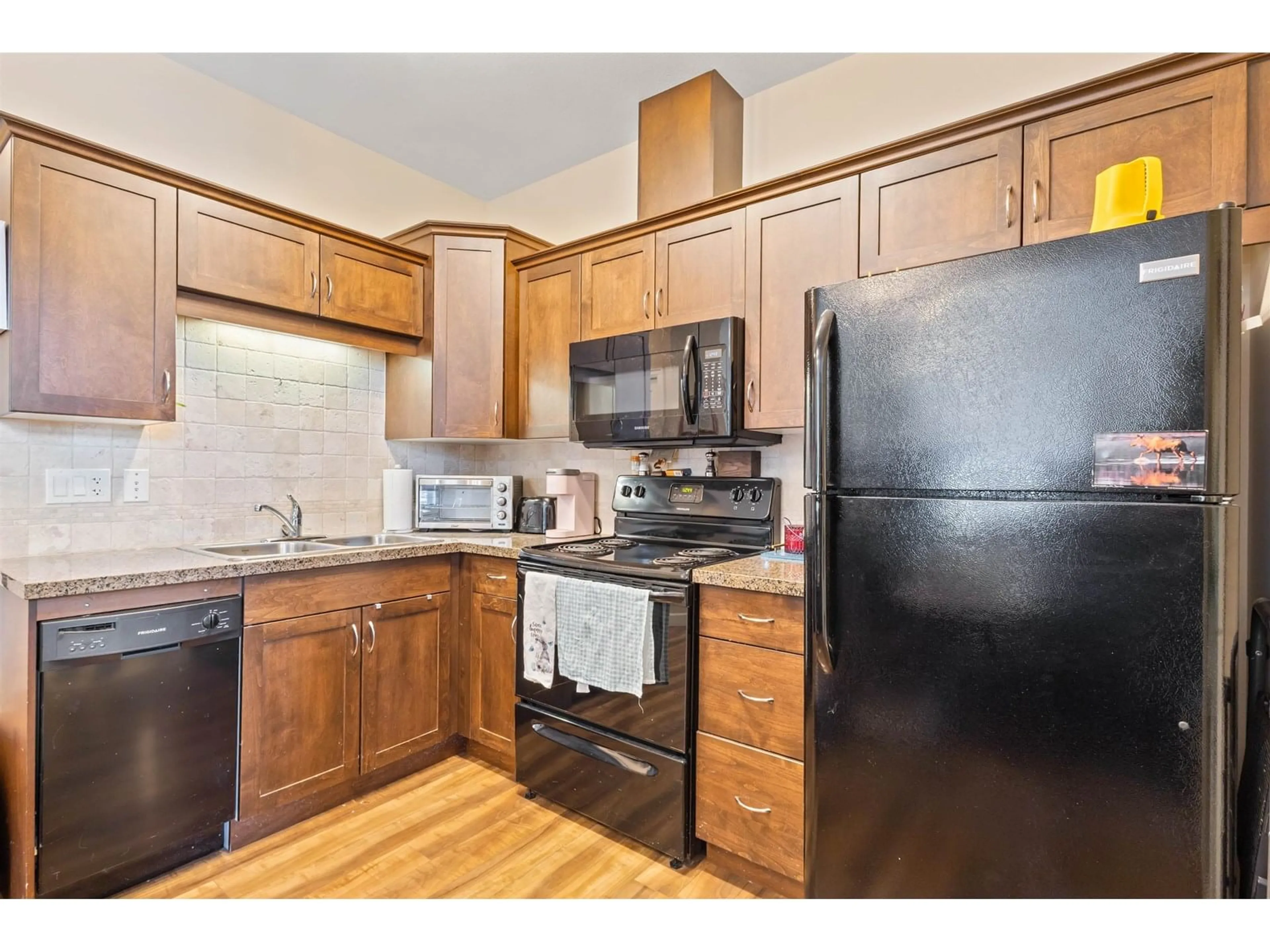 Standard kitchen, wood/laminate floor for 417 - 8531 YOUNG ROAD, Chilliwack British Columbia V2P0E1