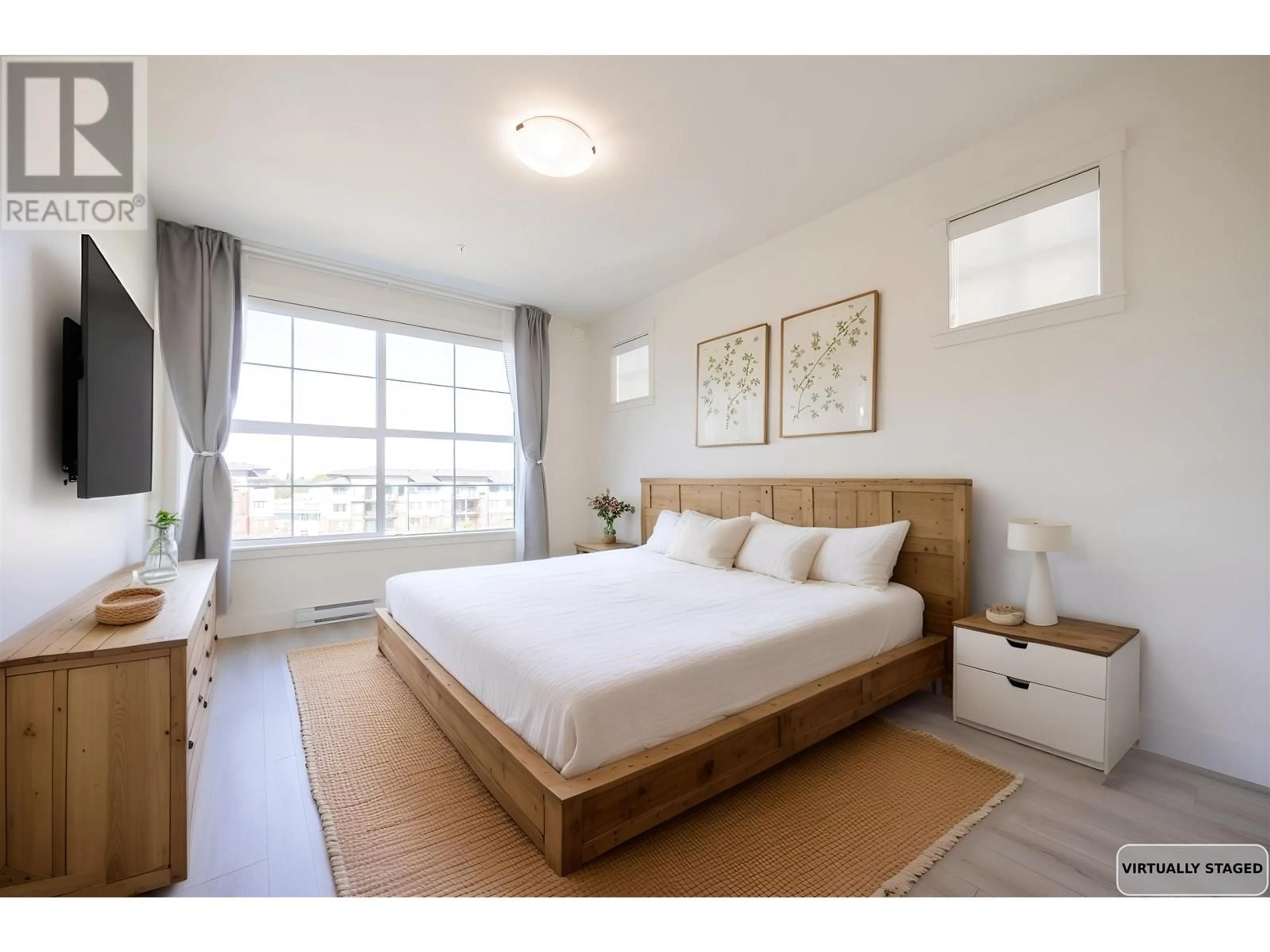 Bedroom with bed, wood/laminate floor for 403 - 11865 227 STREET, Maple Ridge British Columbia V2X6H9