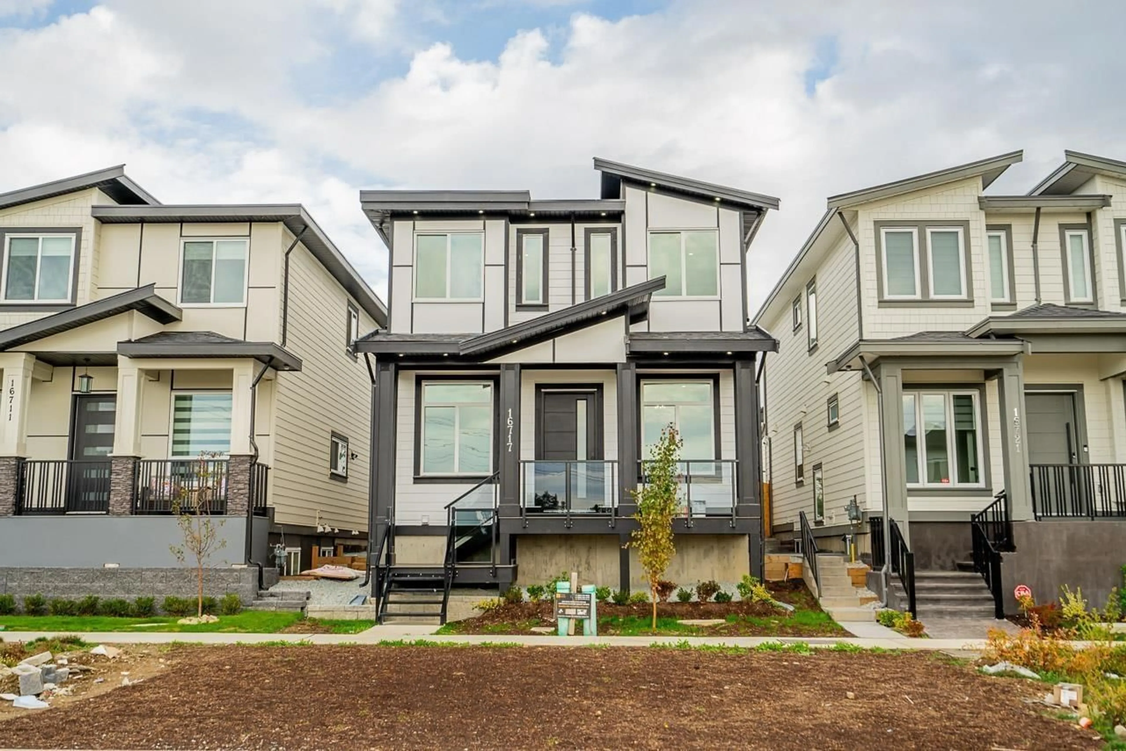 Home with vinyl exterior material, street for 16717 15A, Surrey British Columbia V3S9X7