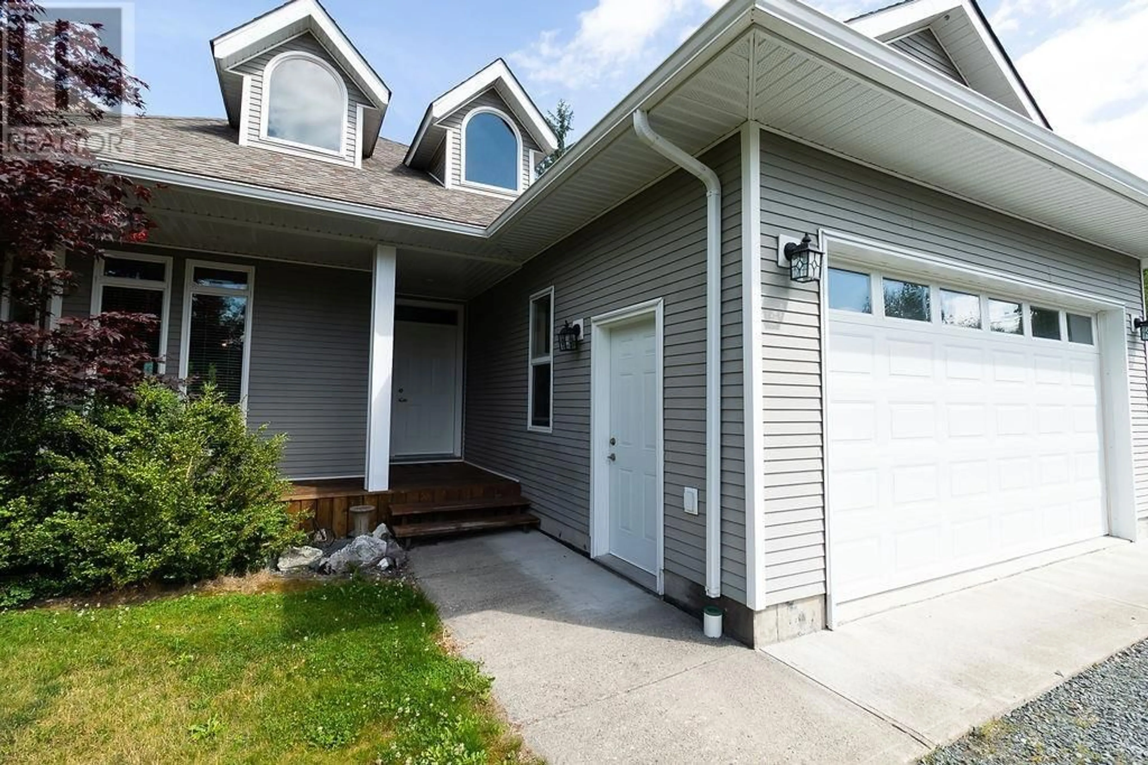 Home with vinyl exterior material, street for 5240 HAUGLAND AVENUE, Terrace British Columbia V8G1H6