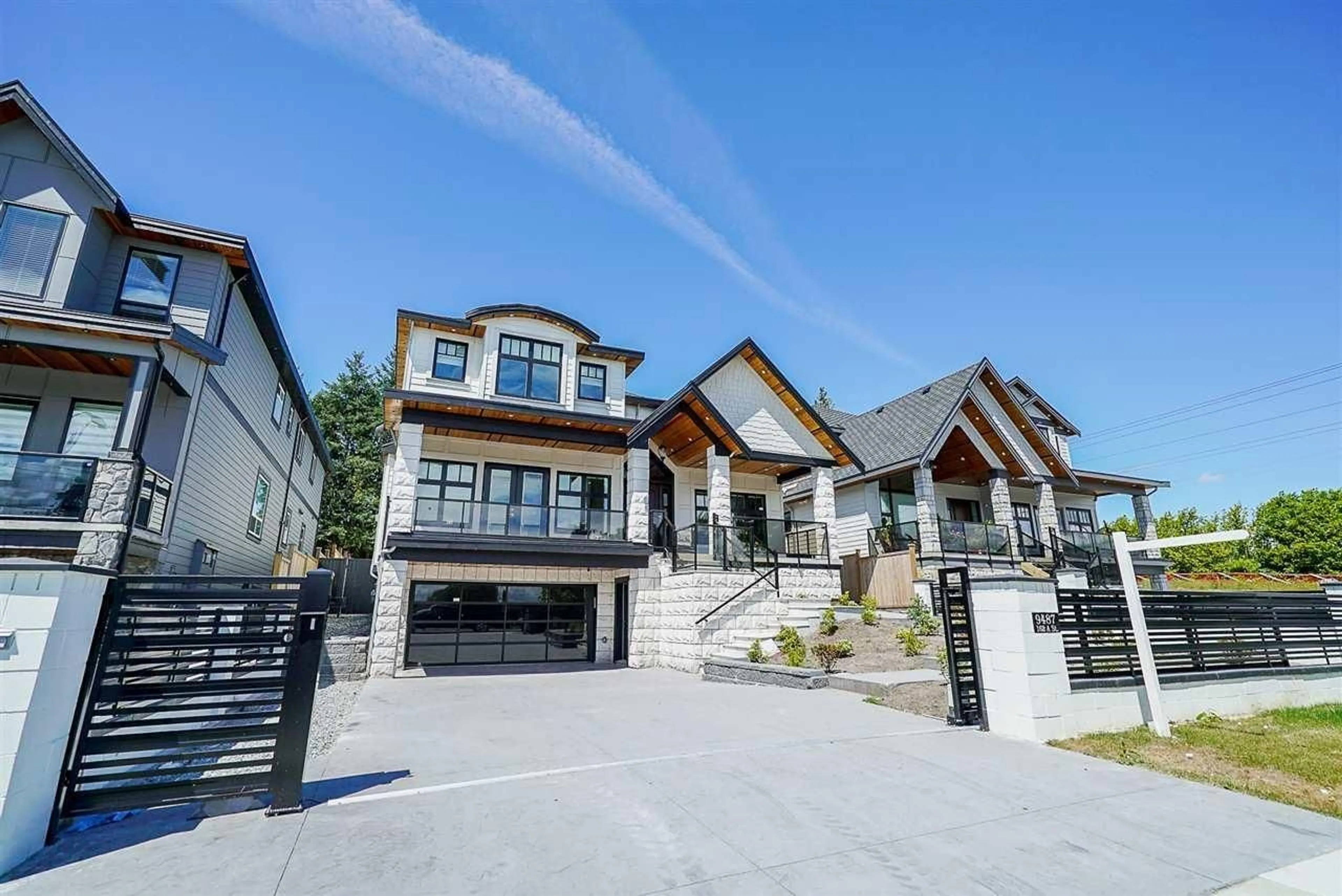 Home with brick exterior material, street for 9487 162A, Surrey British Columbia V4N2B7