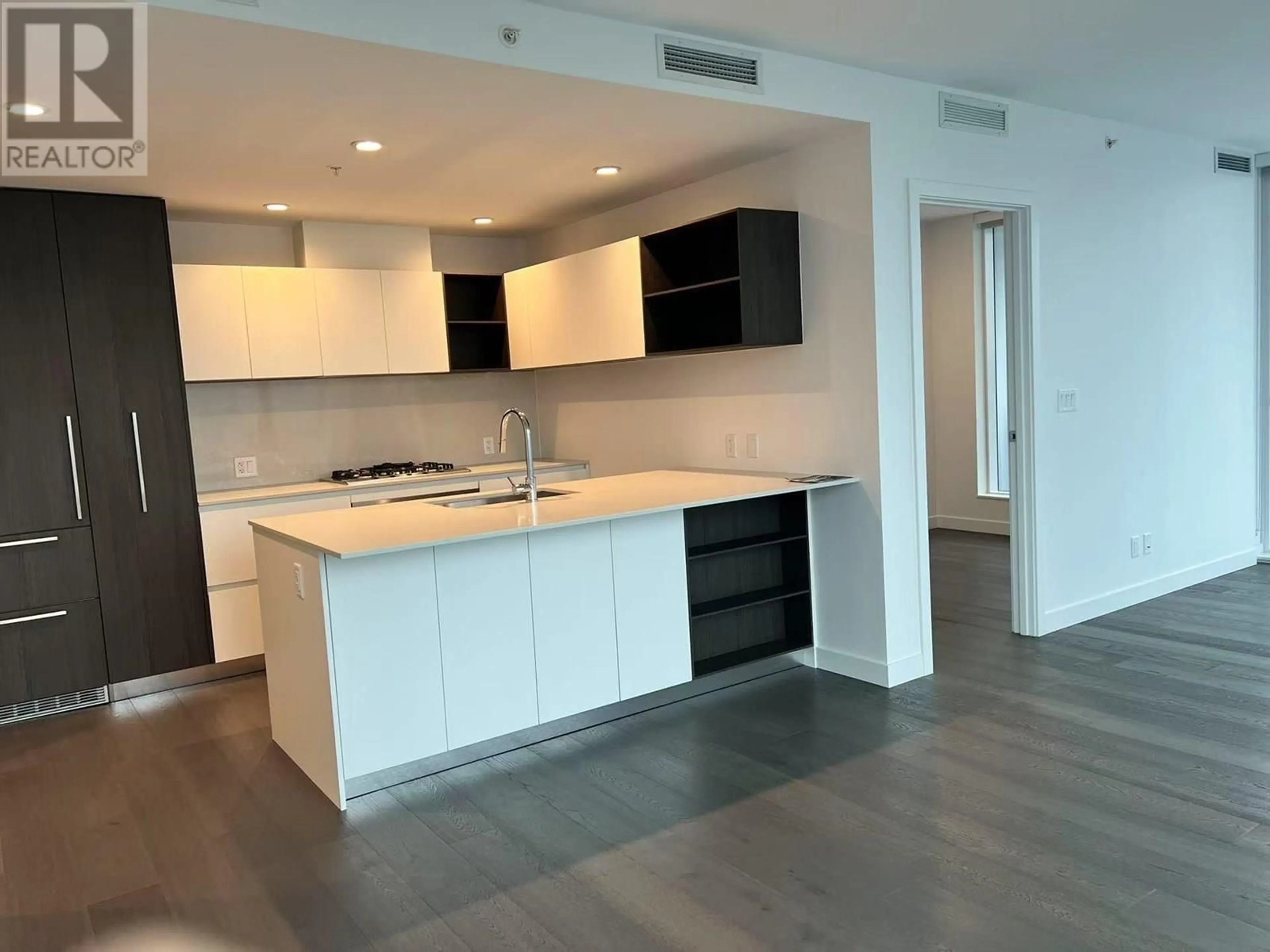 Open concept kitchen, wood/laminate floor for 507 - 6000 MCKAY AVENUE, Burnaby British Columbia V5H0K2