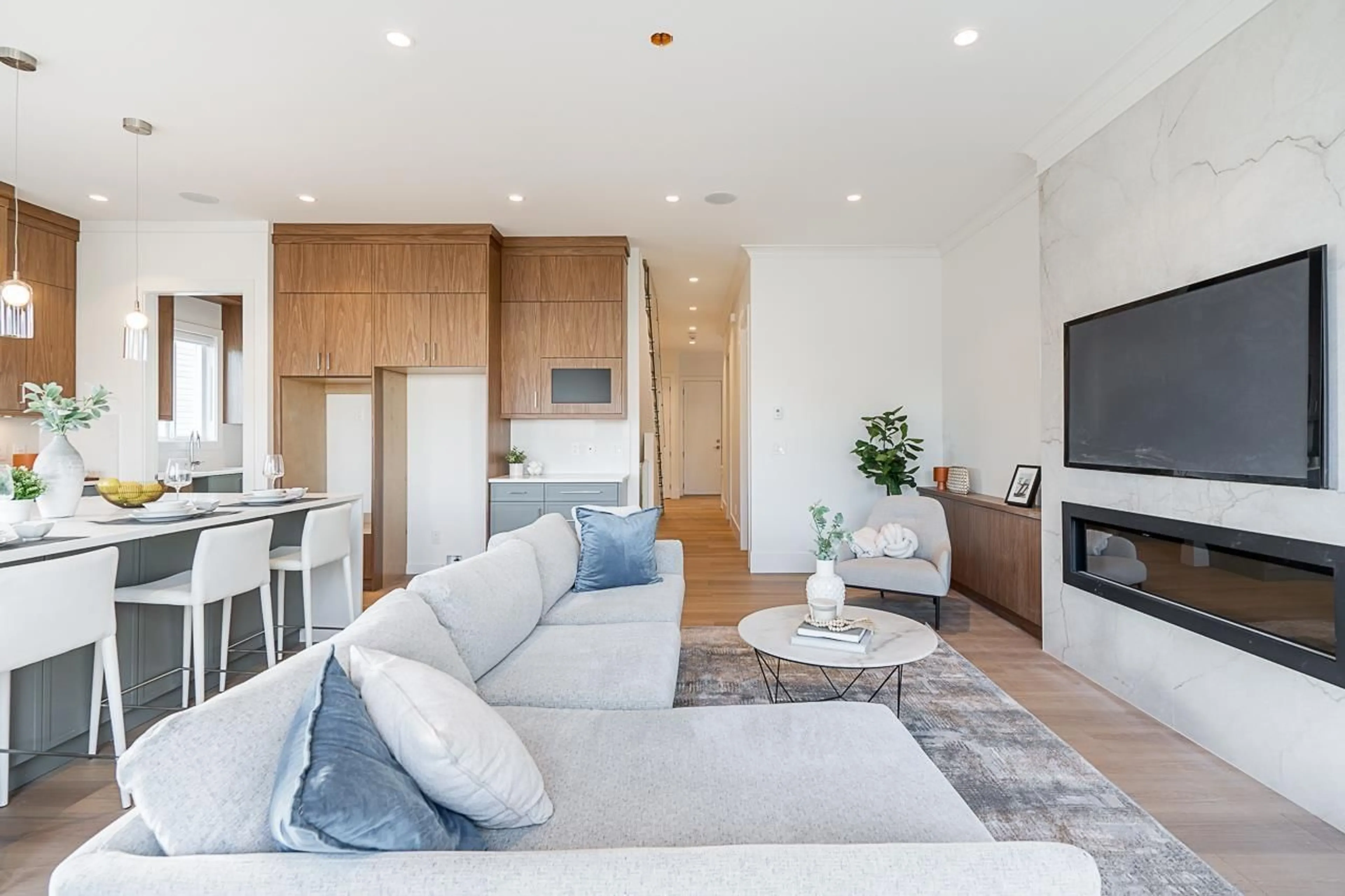 Living room with furniture, wood/laminate floor for 7458 115, Delta British Columbia V4C5M5