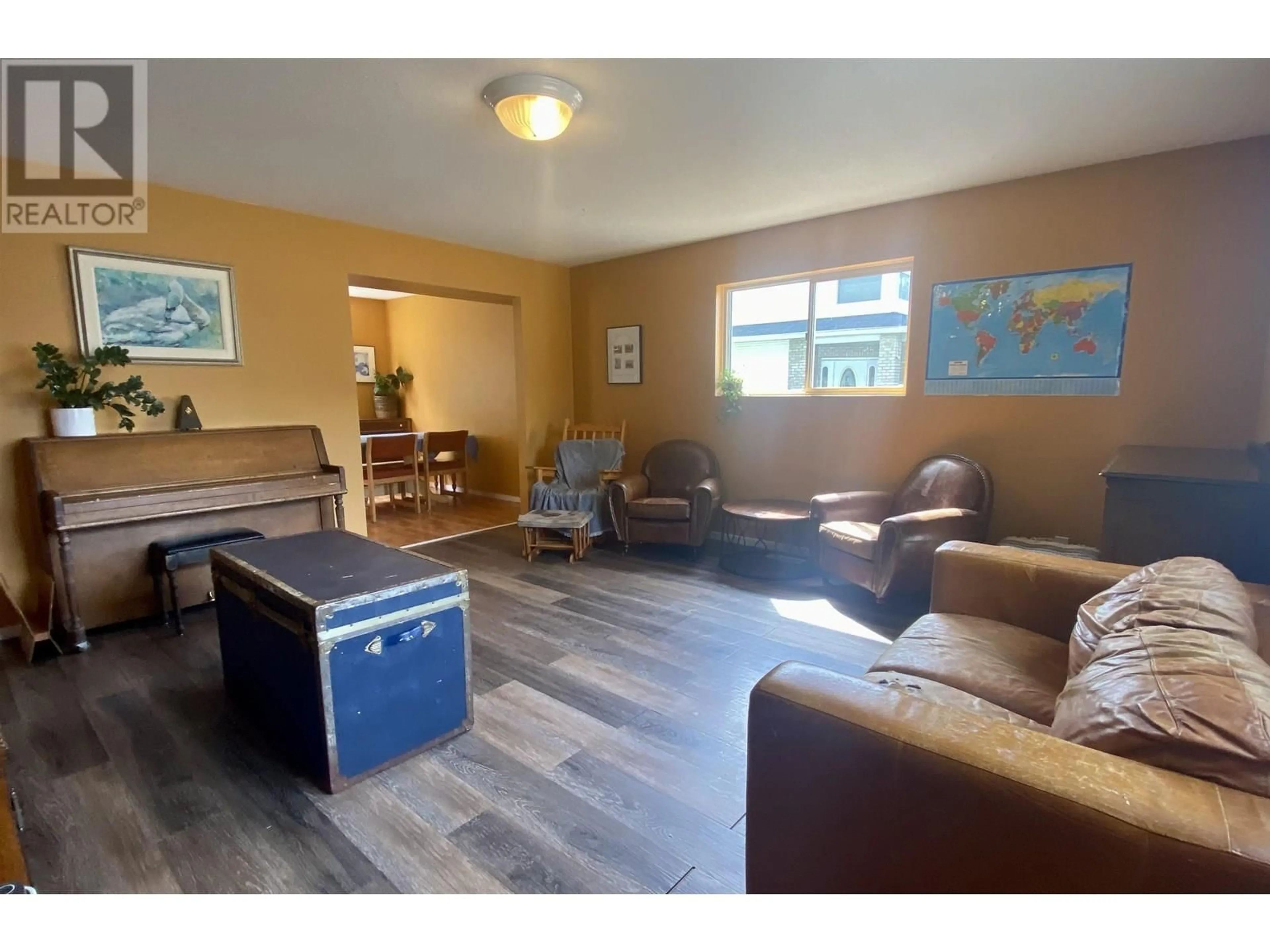 Living room with furniture, wood/laminate floor for 2410 KALUM STREET, Terrace British Columbia V8G2M3