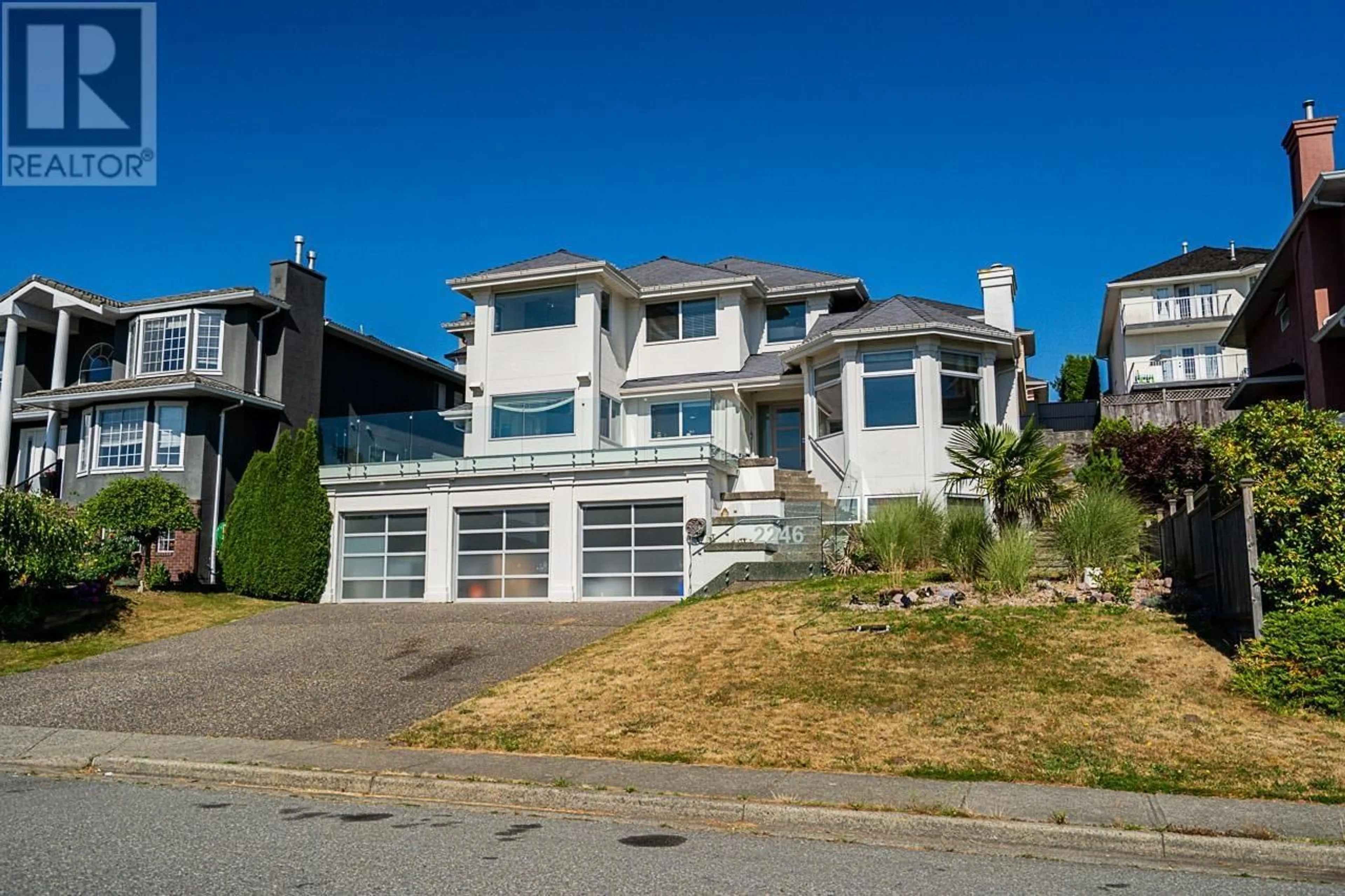 Home with vinyl exterior material, street for 2246 SICAMOUS AVENUE, Coquitlam British Columbia V3K6R9