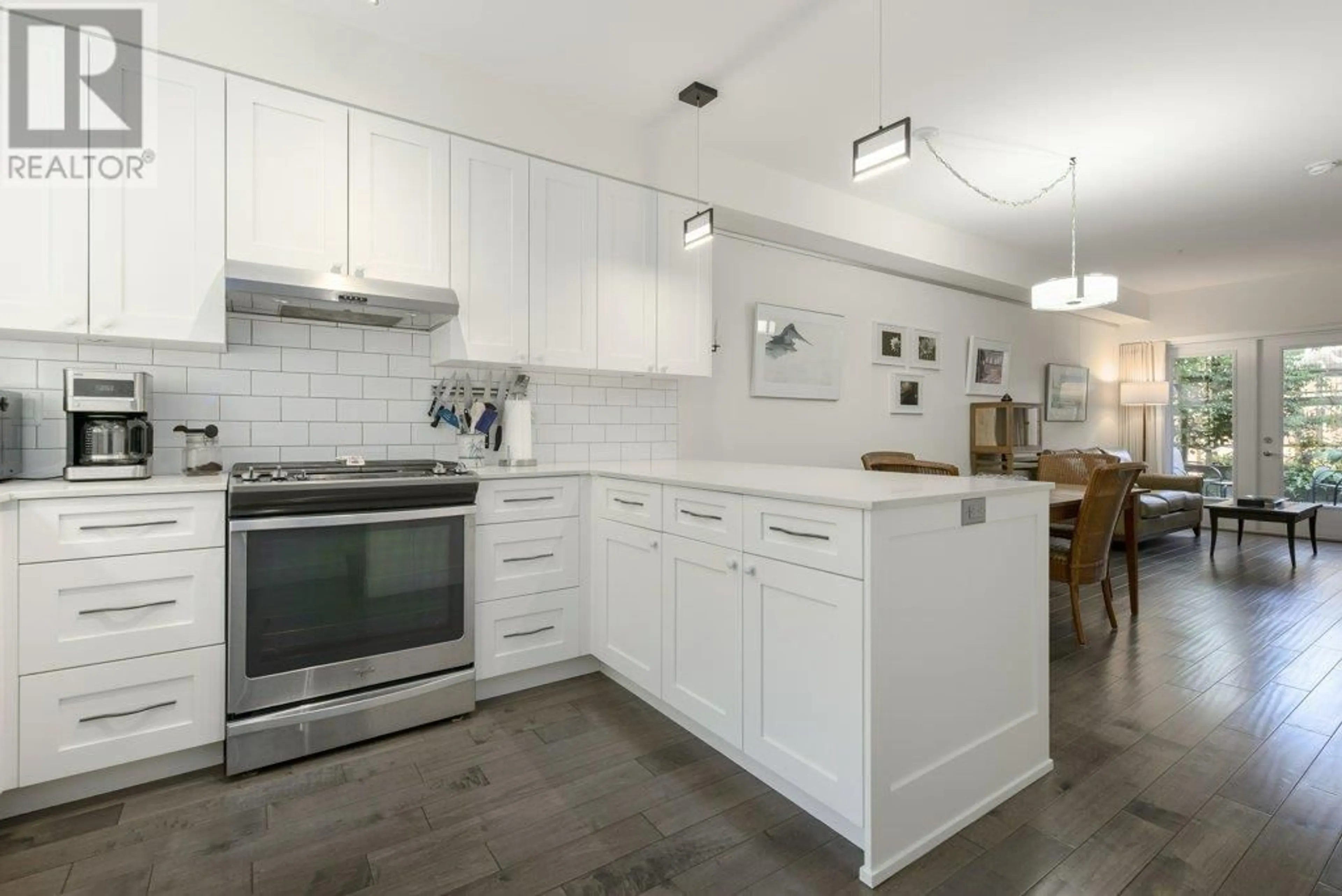 Open concept kitchen, ceramic/tile floor for 112 - 1733 33RD AVENUE, Vancouver British Columbia V5N3E3