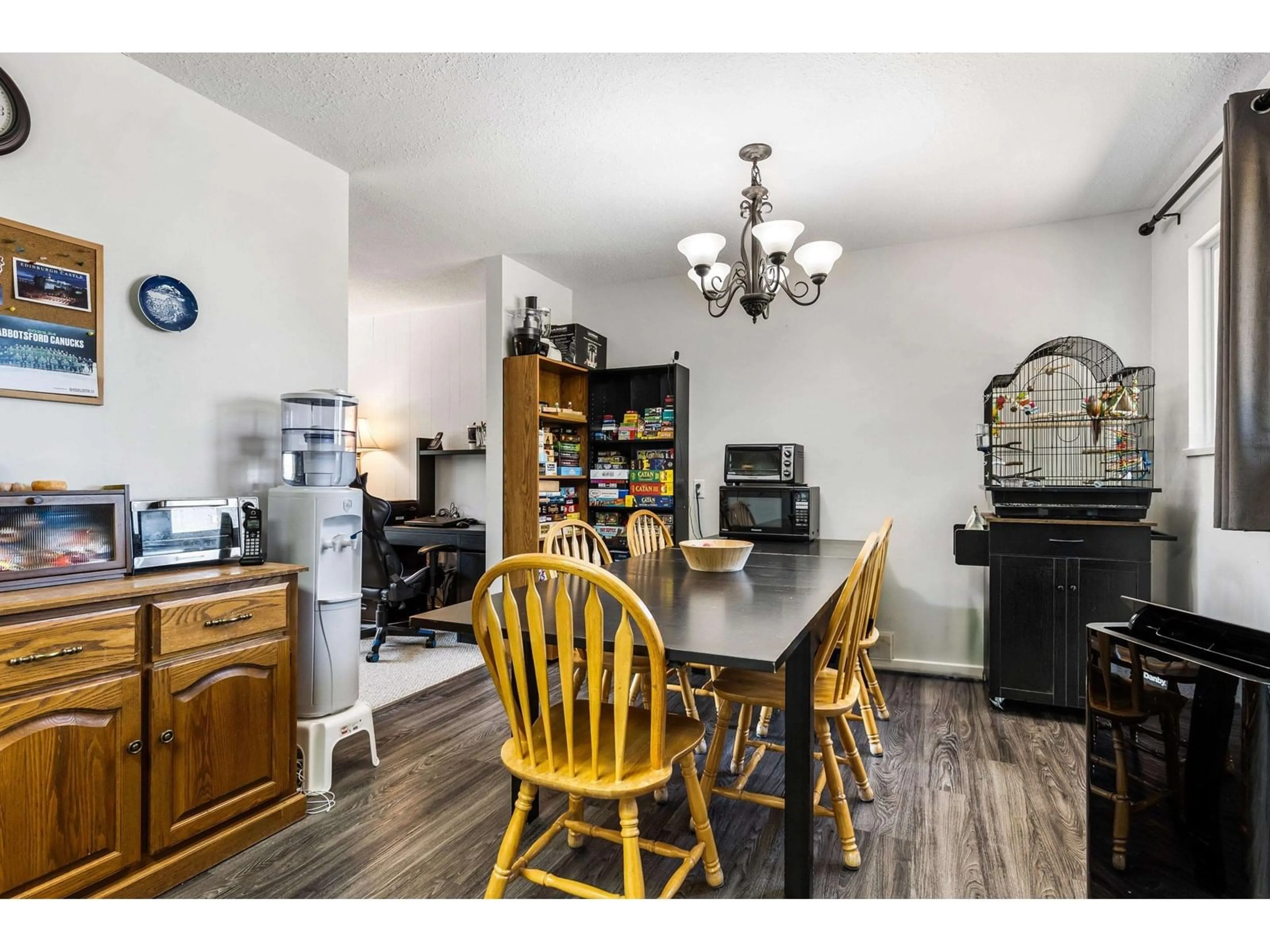 Dining room, wood/laminate floor for 34805 CHAMPLAIN, Abbotsford British Columbia V2S5P3