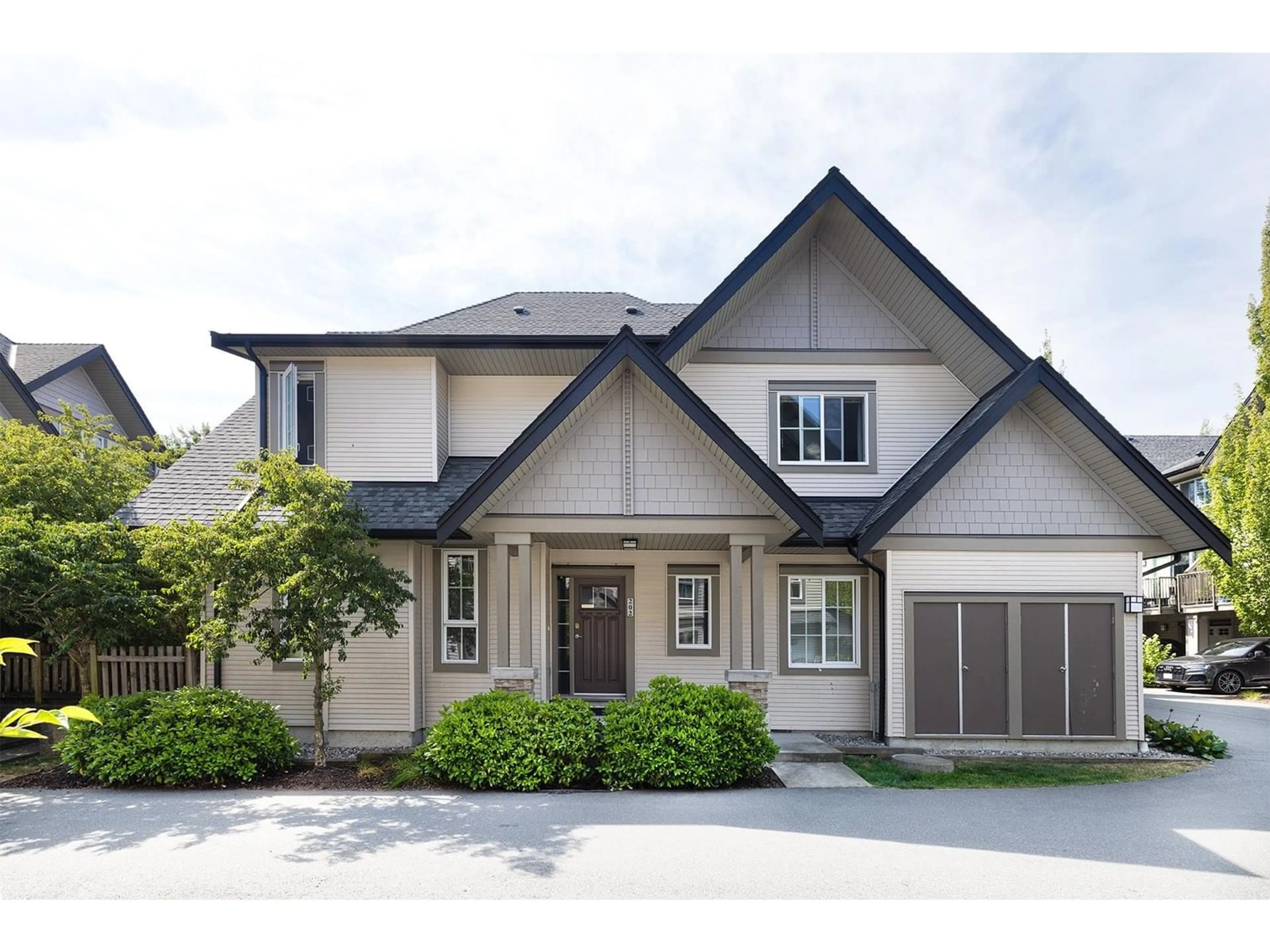 Home with brick exterior material, street for 202 - 2501 161A, Surrey British Columbia V3Z7Y6