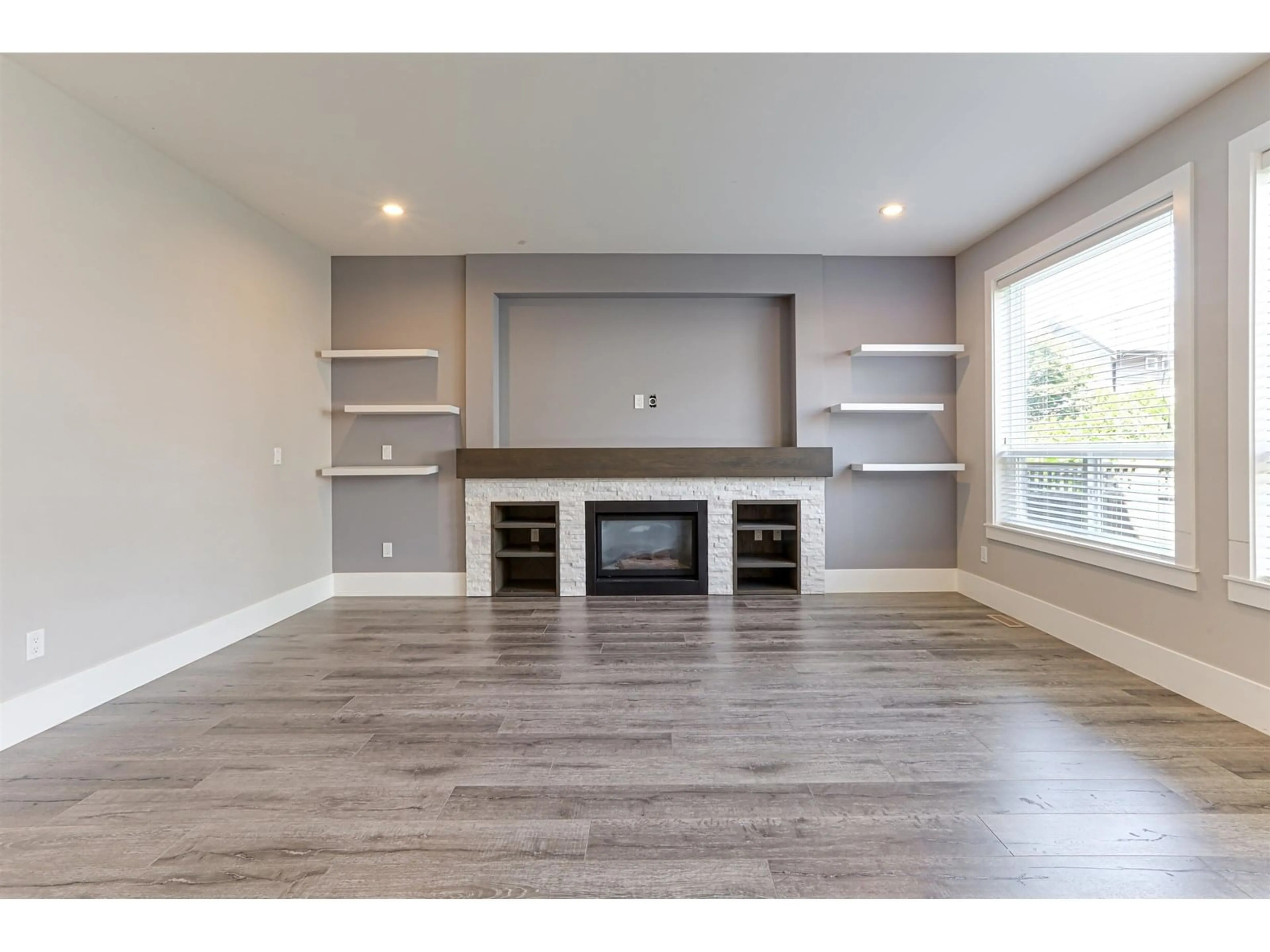 Living room with furniture, wood/laminate floor for 6038 145, Surrey British Columbia V3S4R4