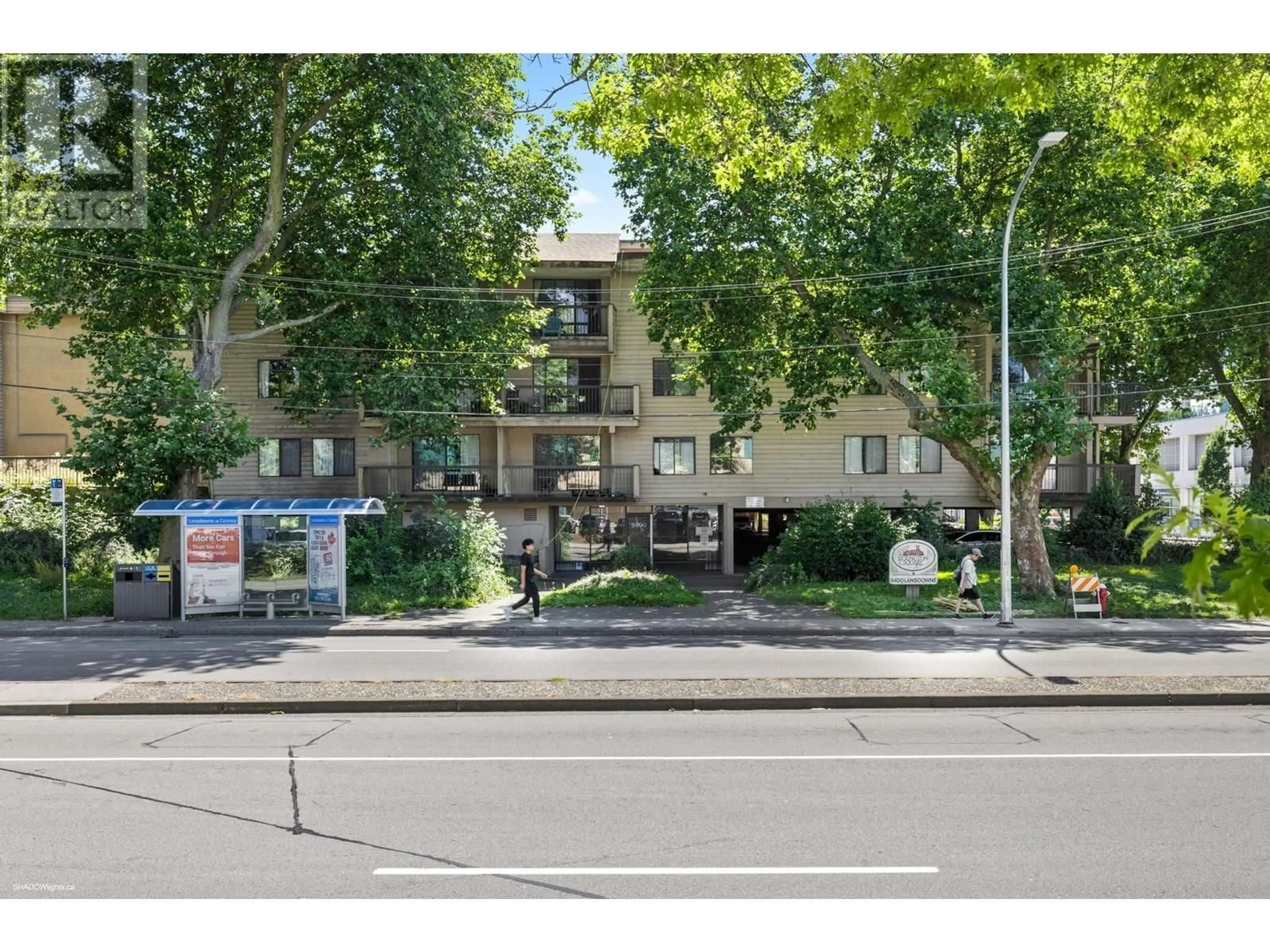 A pic from outside/outdoor area/front of a property/back of a property/a pic from drone, street for 211 - 8400 LANSDOWNE ROAD, Richmond British Columbia V6X3G3