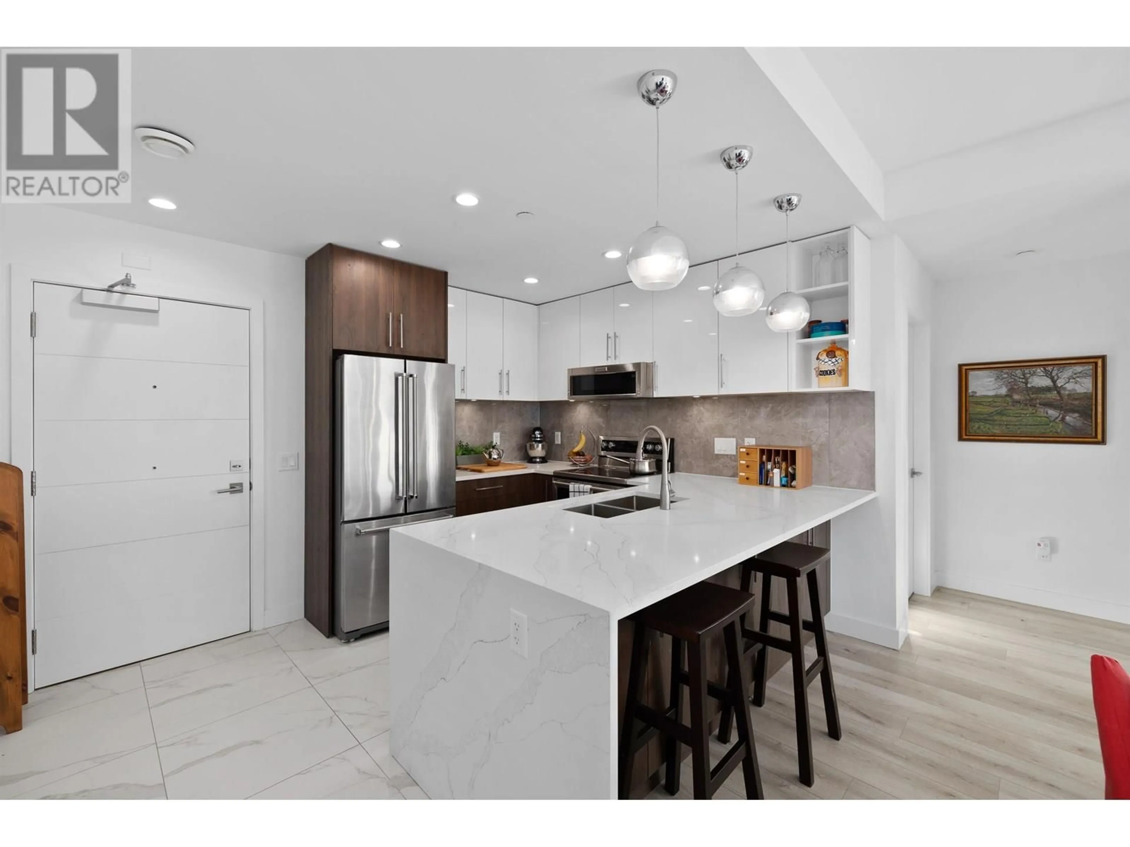 Open concept kitchen, ceramic/tile floor for 104 - 11718 224 STREET, Maple Ridge British Columbia V2X6A2