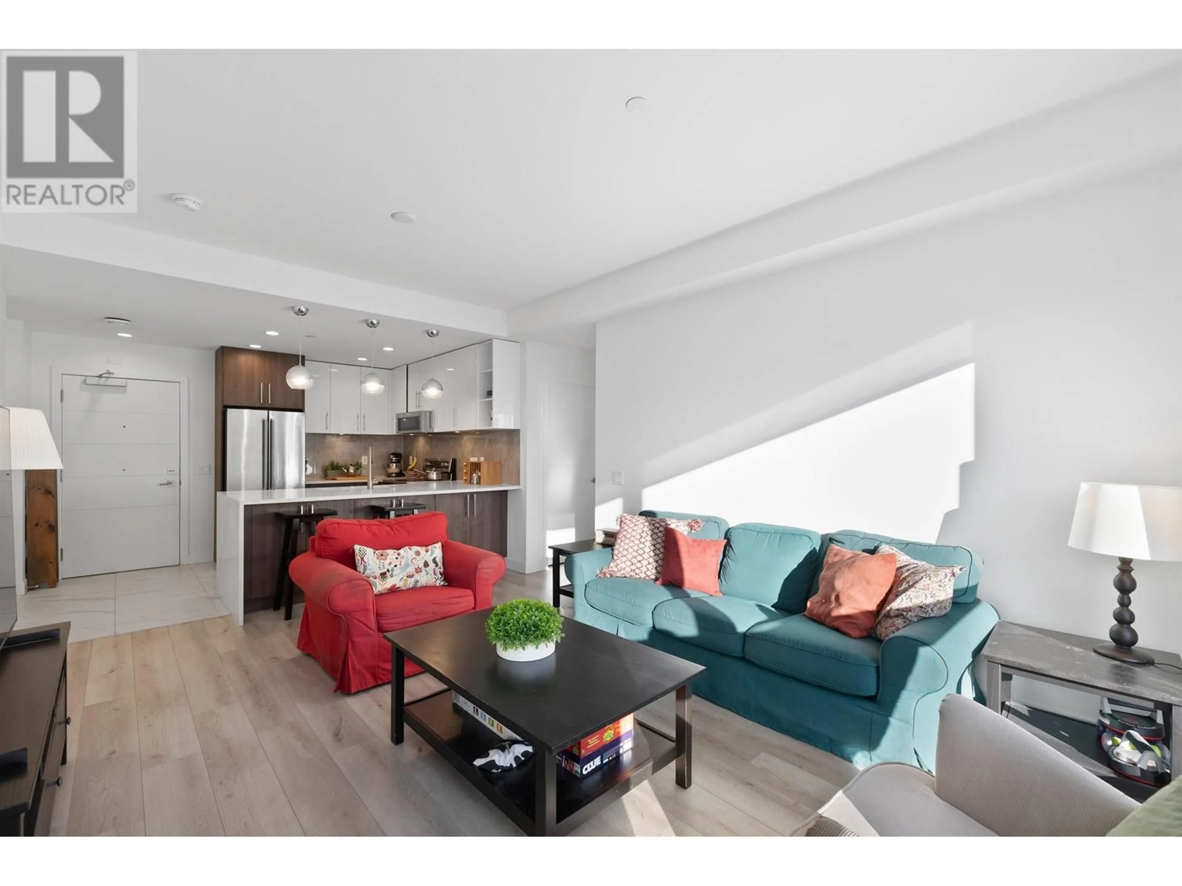 Living room with furniture, wood/laminate floor for 104 - 11718 224 STREET, Maple Ridge British Columbia V2X6A2