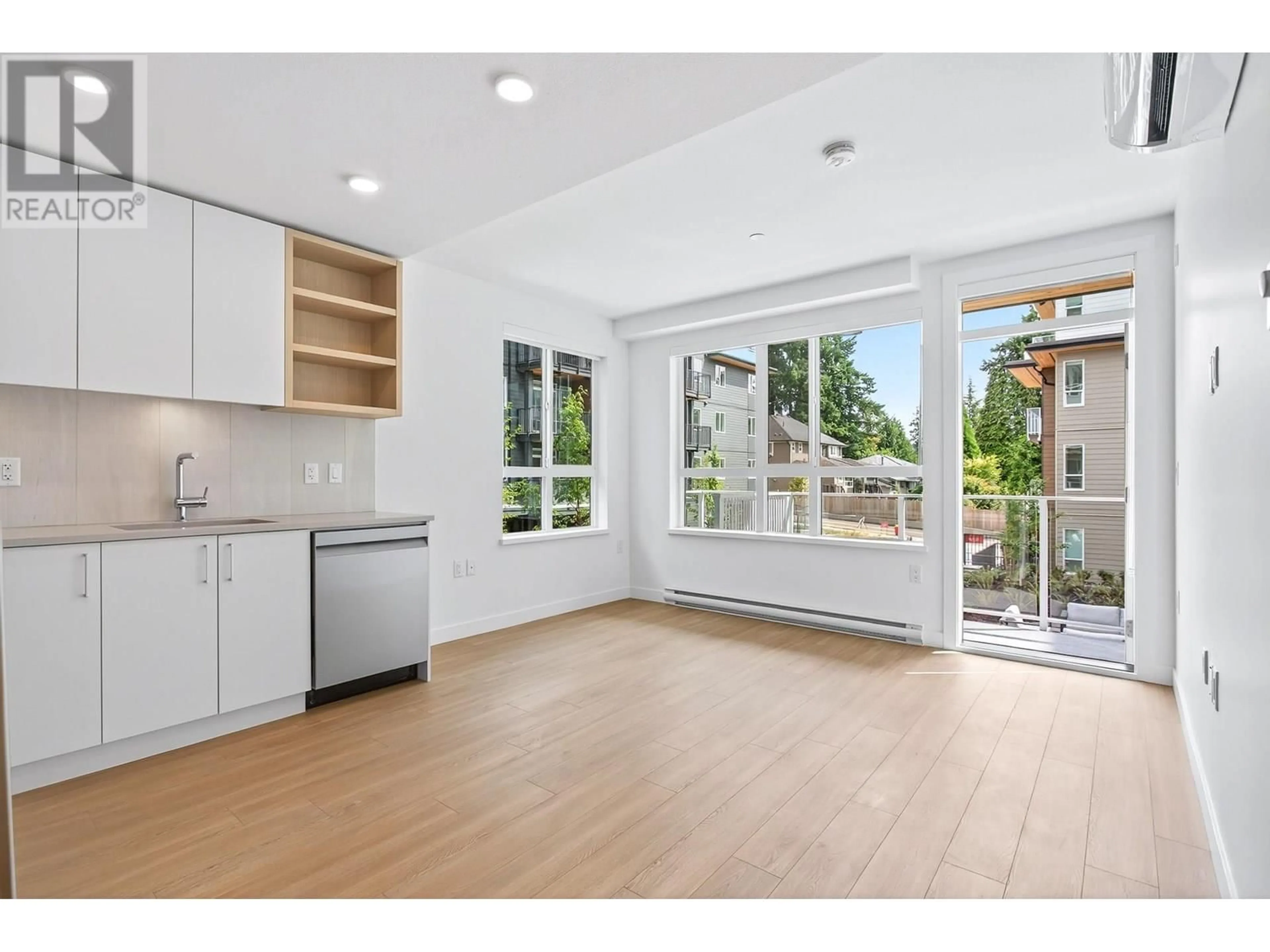 Open concept kitchen, wood/laminate floor for 310 - 723 GROVER AVENUE, Coquitlam British Columbia V3J0L9