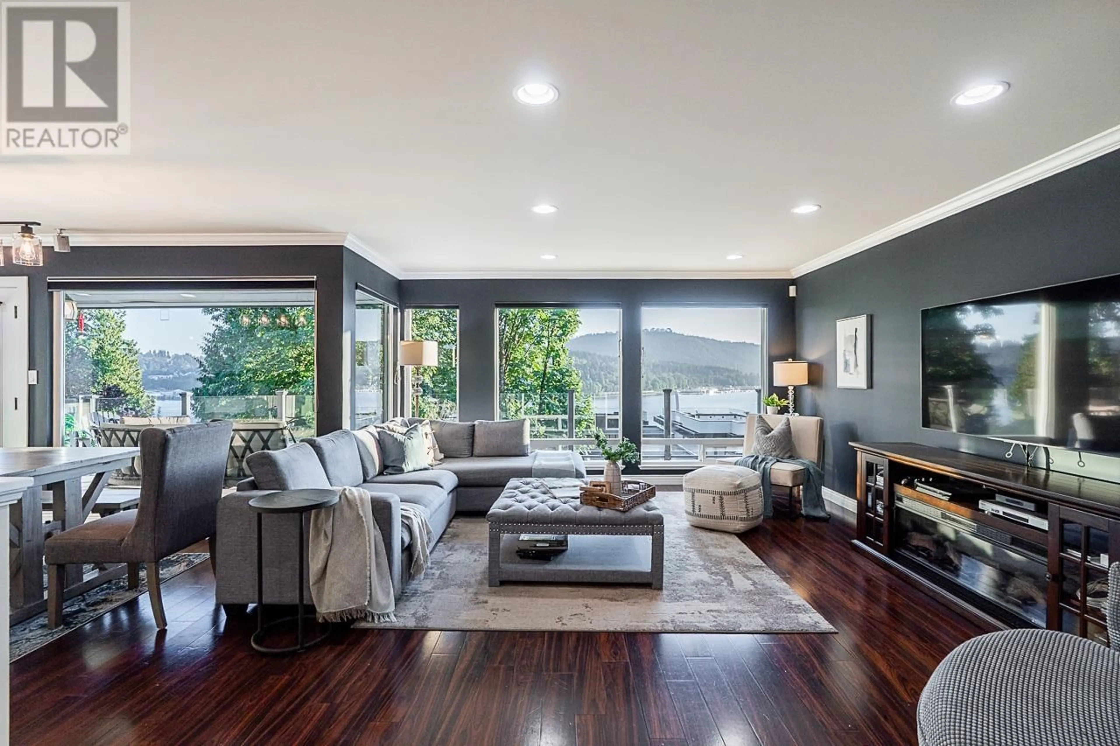 Living room with furniture, wood/laminate floor for 18 BEDINGFIELD STREET, Port Moody British Columbia V3H3N1