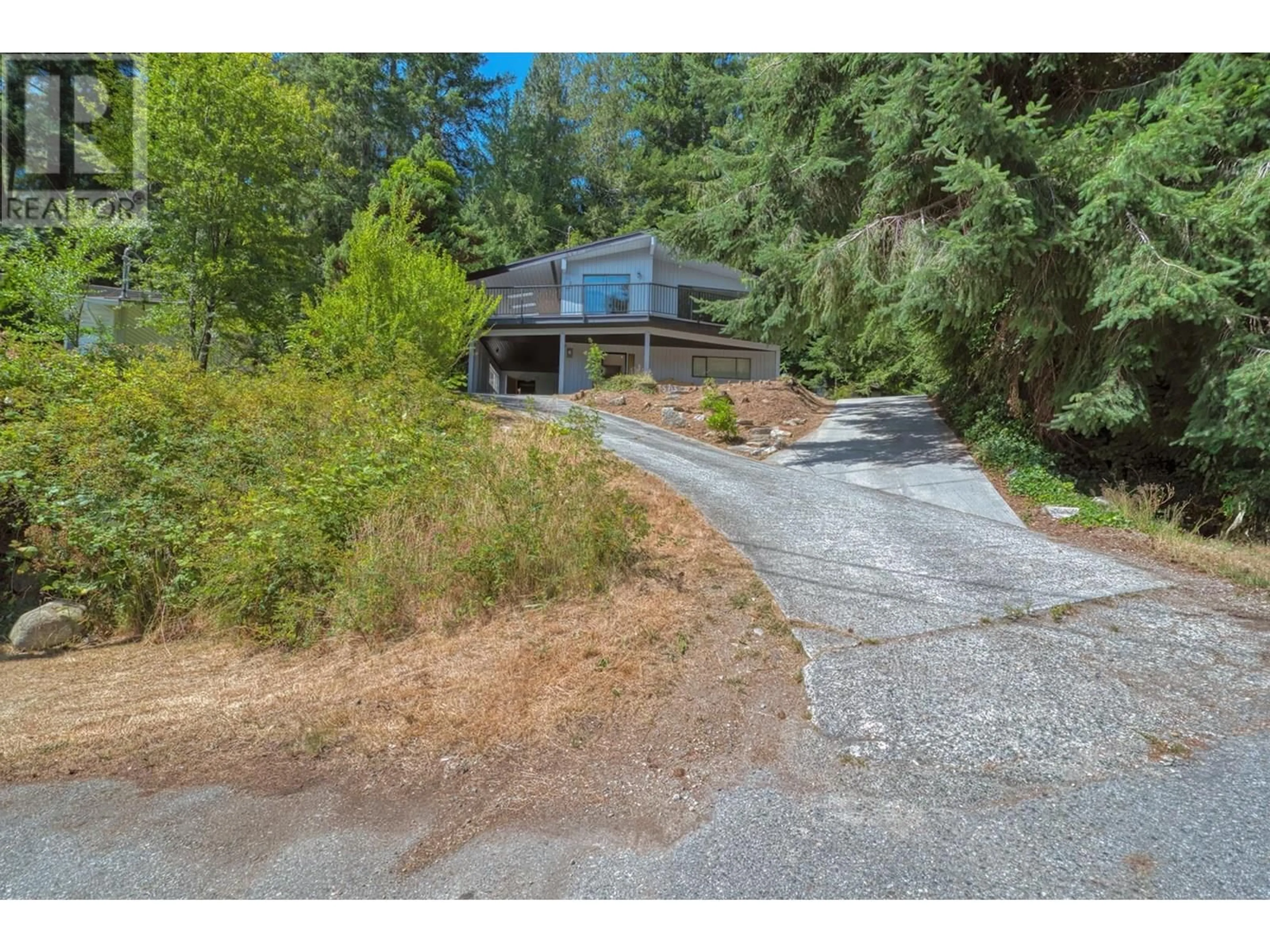 A pic from outside/outdoor area/front of a property/back of a property/a pic from drone, unknown for 5713 SALMON DRIVE, Sechelt British Columbia V0N3A0