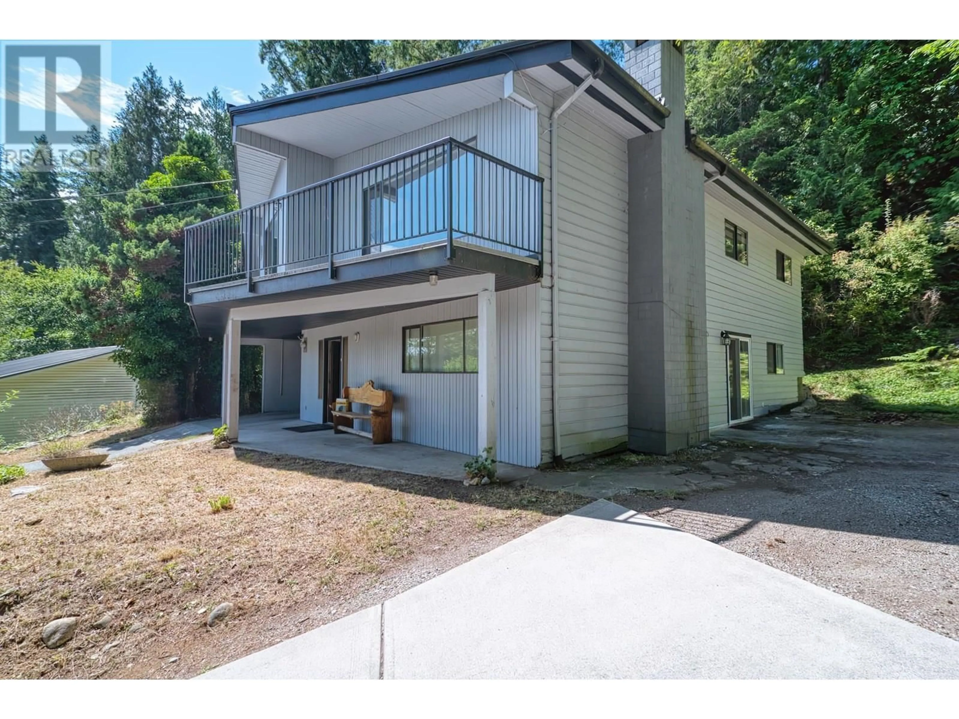 A pic from outside/outdoor area/front of a property/back of a property/a pic from drone, street for 5713 SALMON DRIVE, Sechelt British Columbia V0N3A0