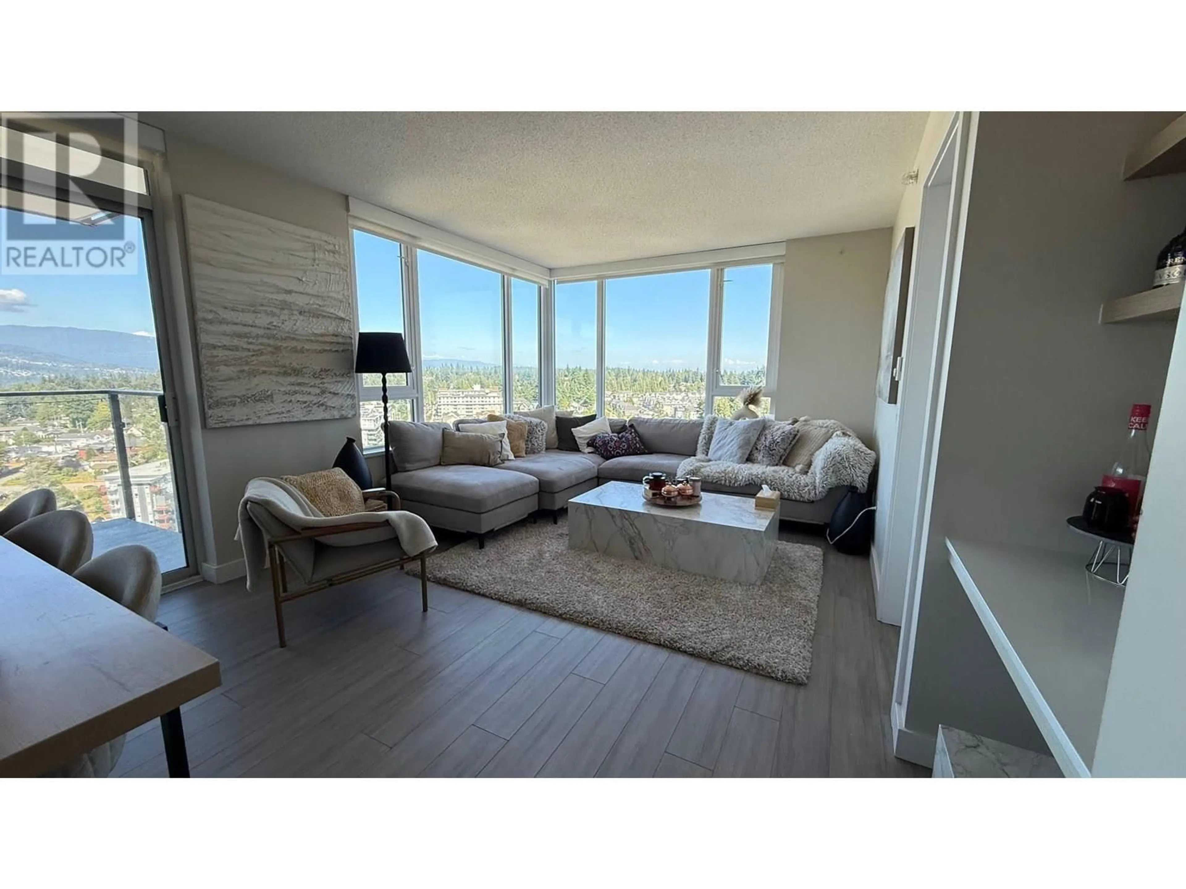 Living room with furniture, unknown for 2503 - 602 COMO LAKE AVENUE, Coquitlam British Columbia V3J0G2