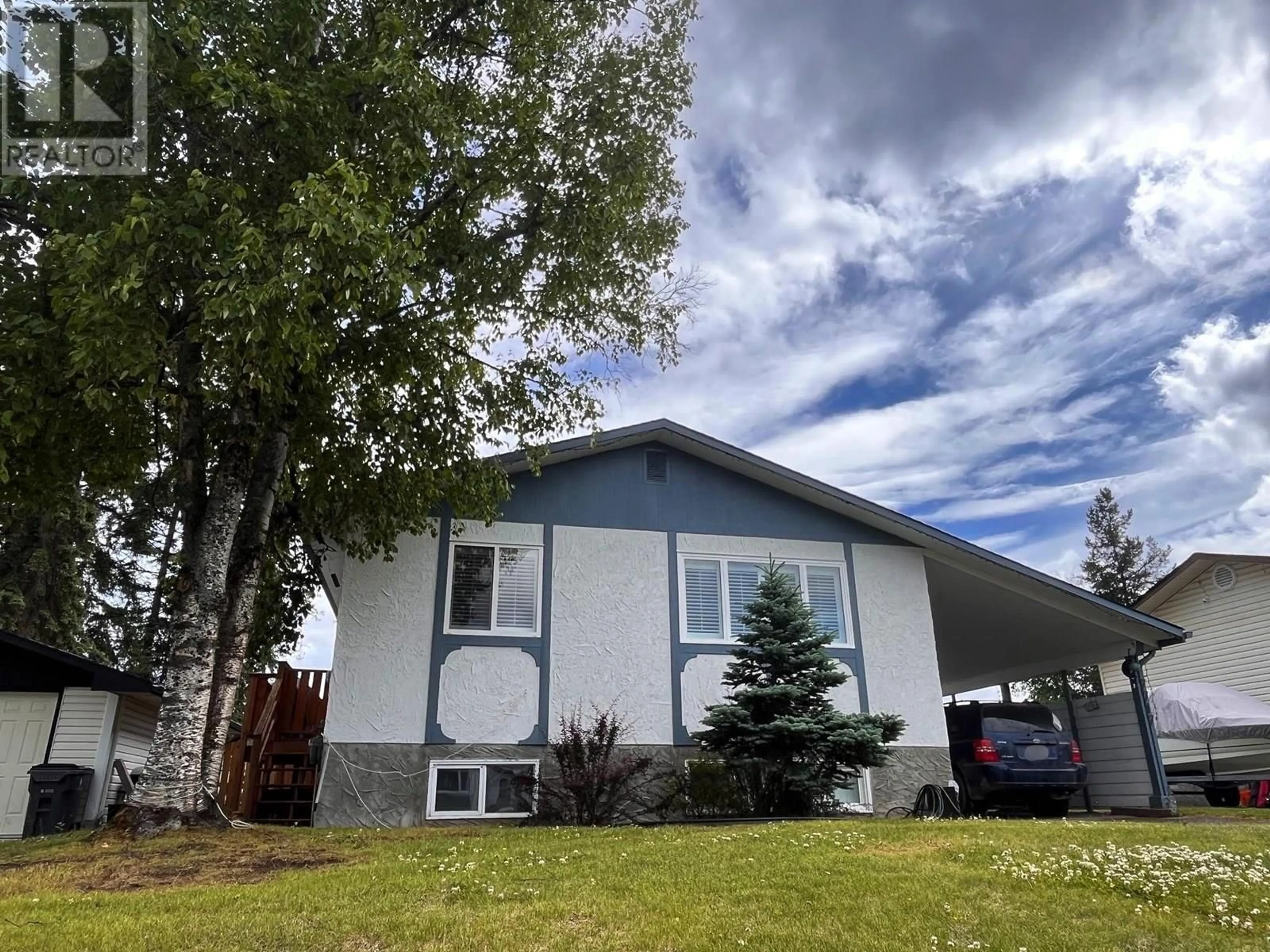 Home with vinyl exterior material, street for 7717 KINGSLEY CRESCENT, Prince George British Columbia V2N3M9