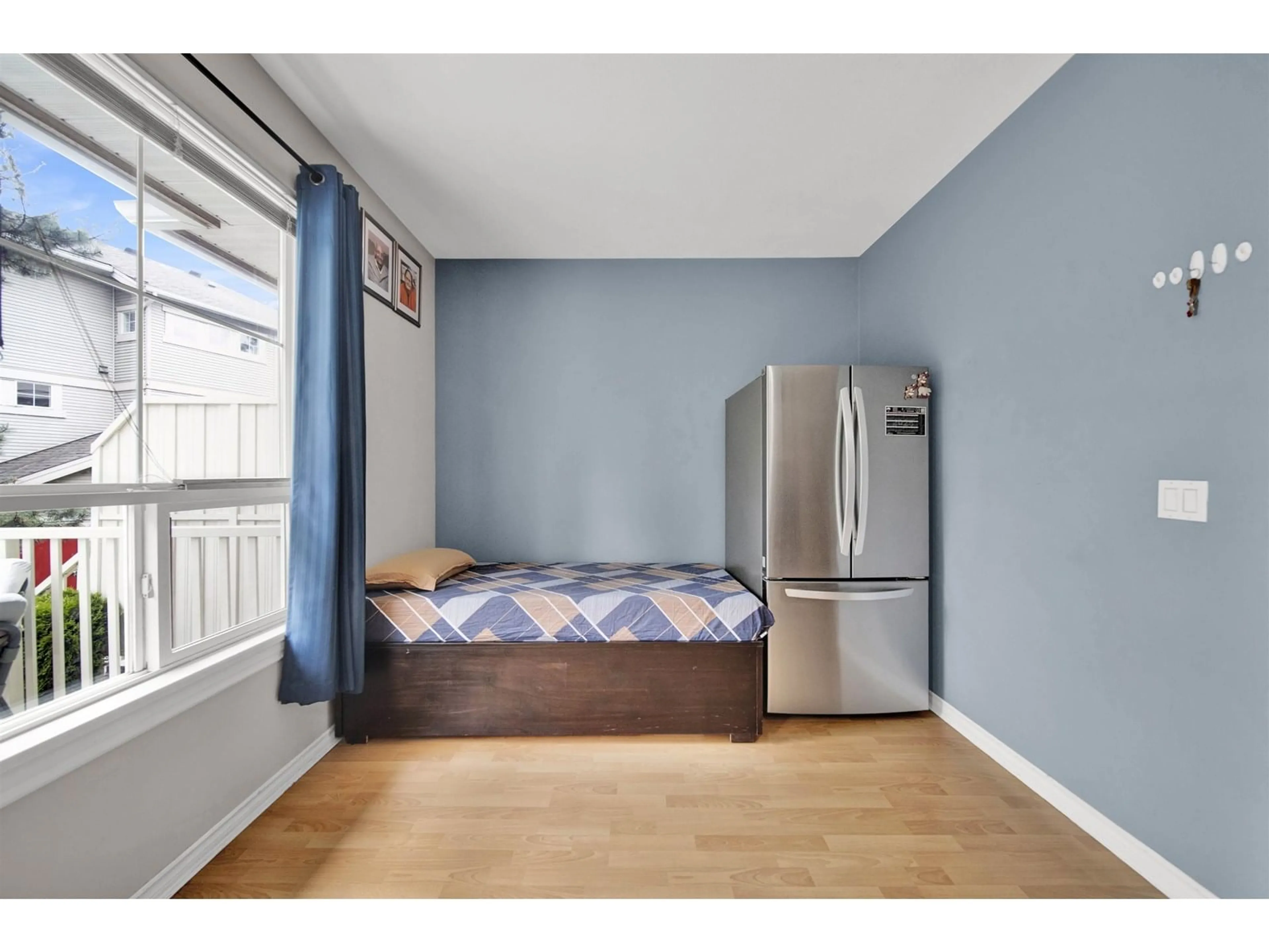 Bedroom with bed, wood/laminate floor for 7 - 14952 58, Surrey British Columbia V3S9J2