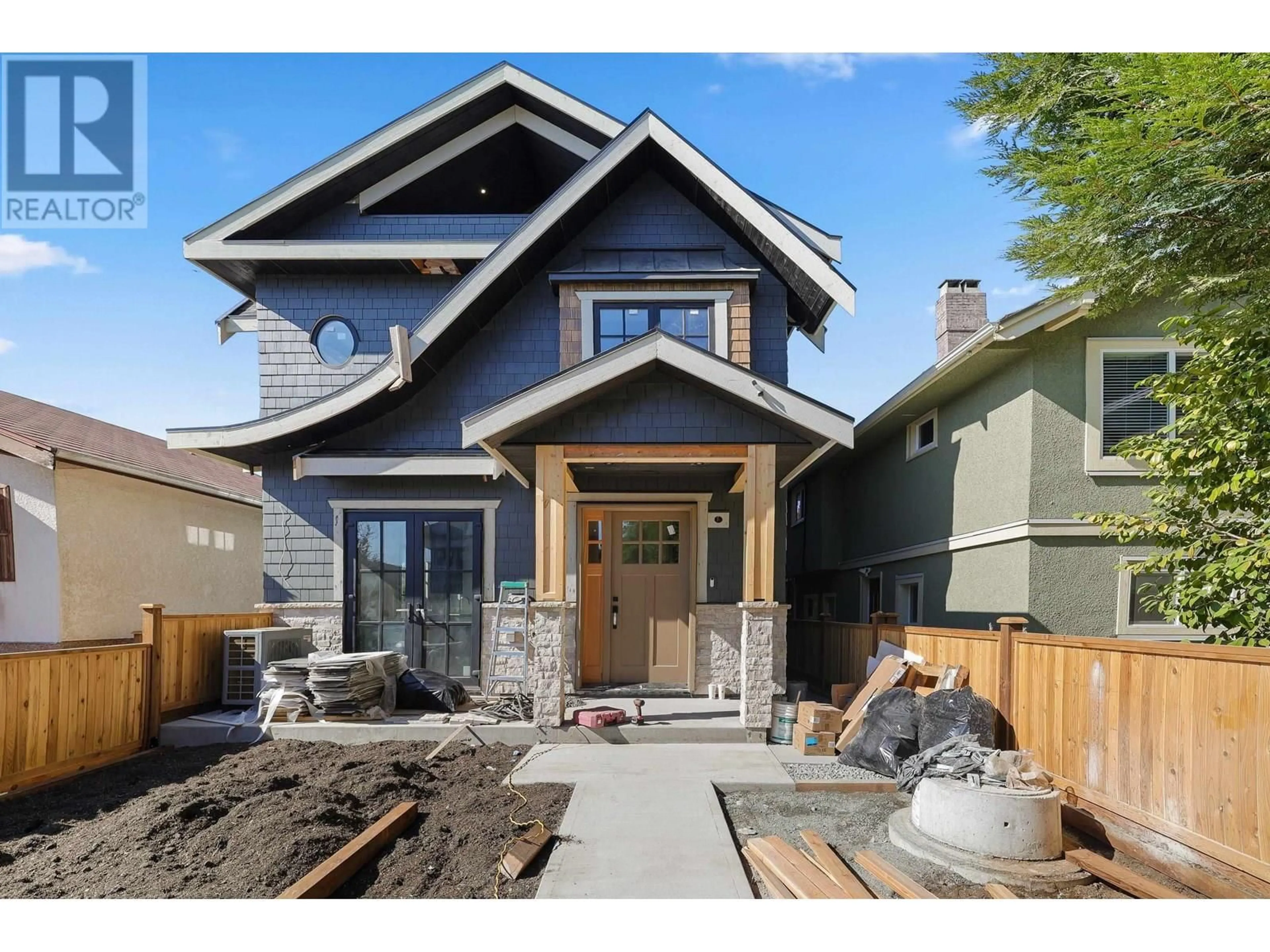 Home with brick exterior material, street for 1 - 2565 DUNDAS STREET, Vancouver British Columbia V5K1P7