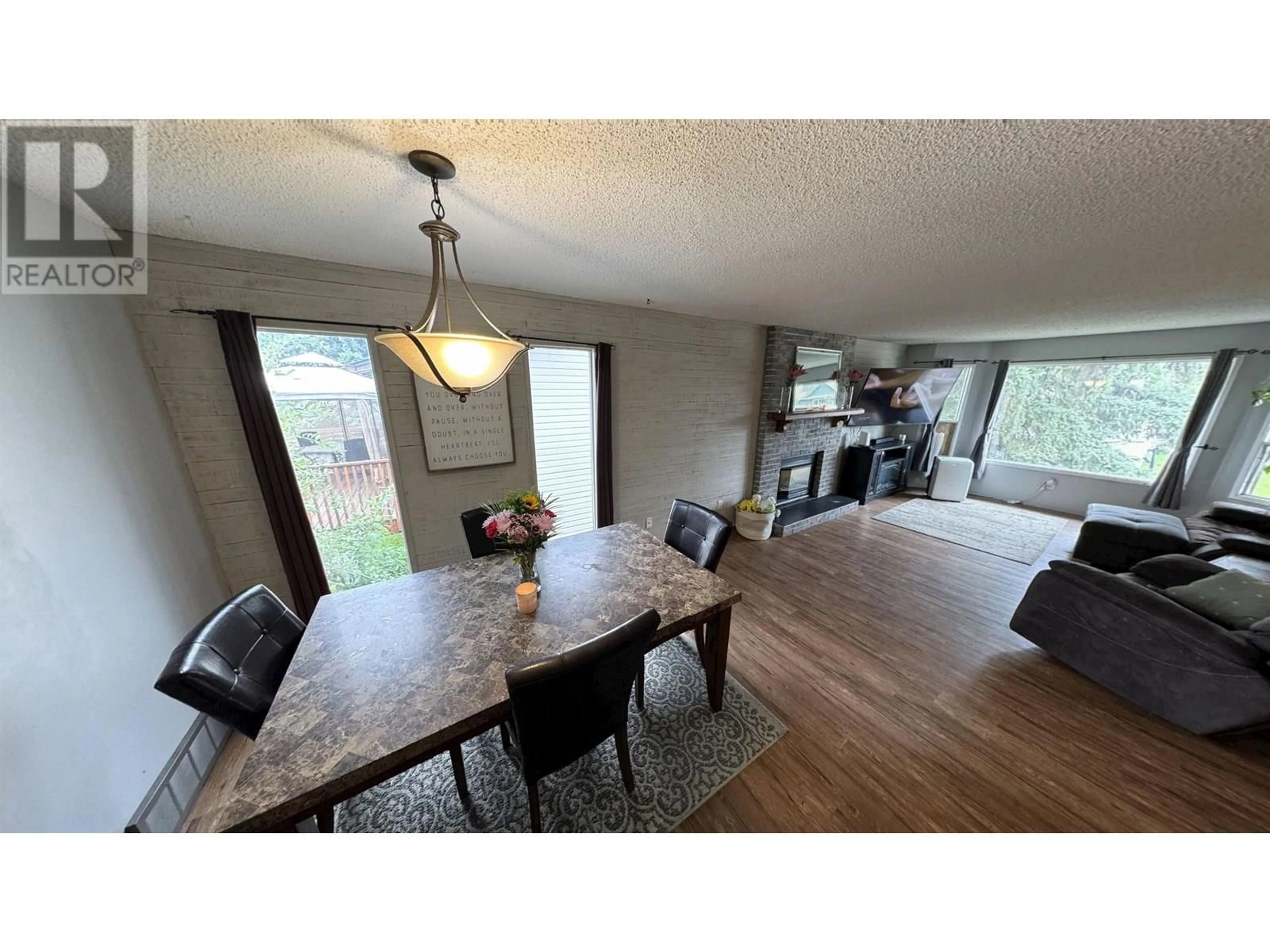 Dining room, wood/laminate floor for 11404 92 STREET, Fort St. John British Columbia V1J4Y3