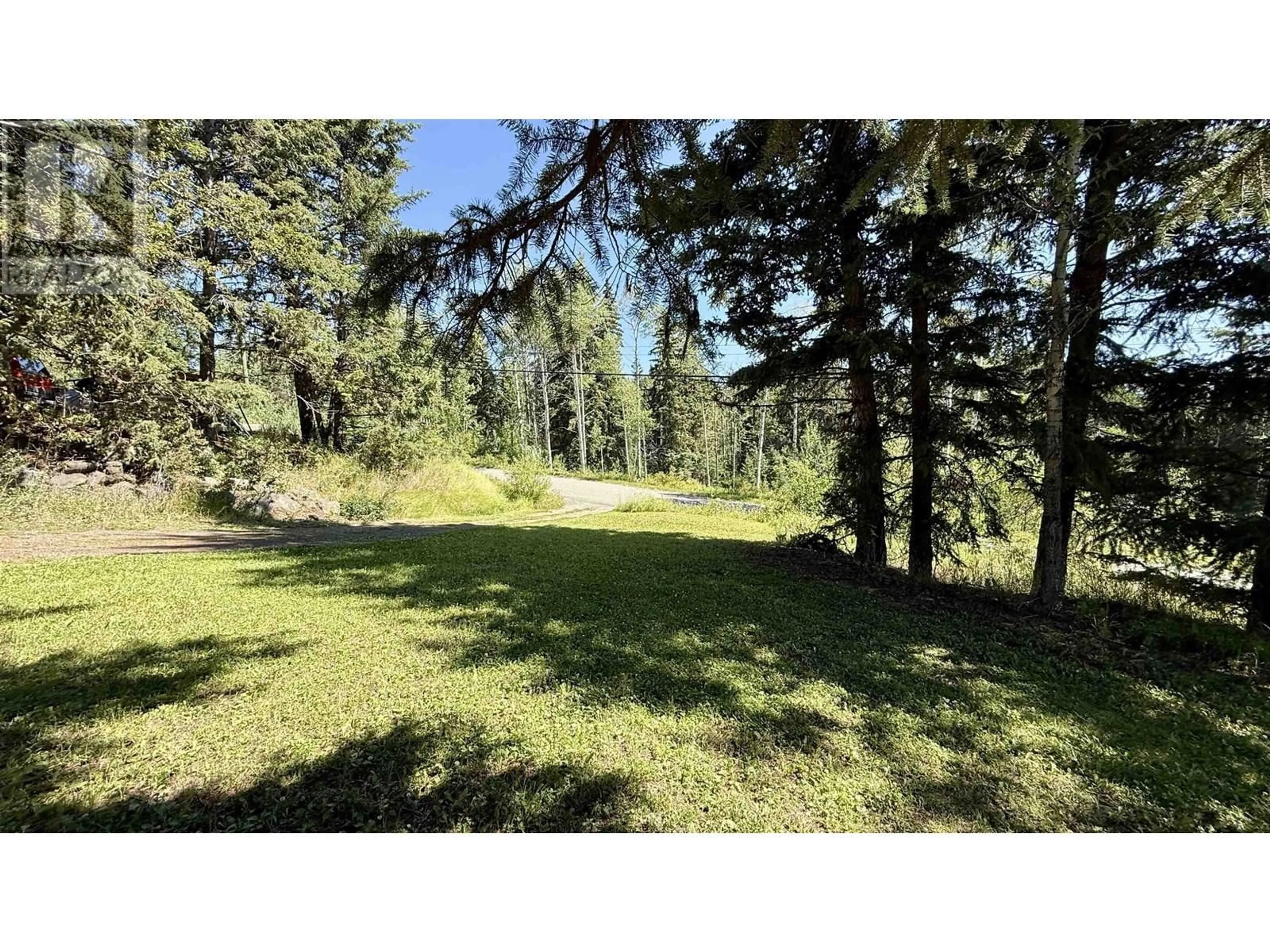A pic from outside/outdoor area/front of a property/back of a property/a pic from drone, forest/trees view for 7538 BRIDGE LAKE BUSINESS RTE, Bridge Lake British Columbia V0K1E0