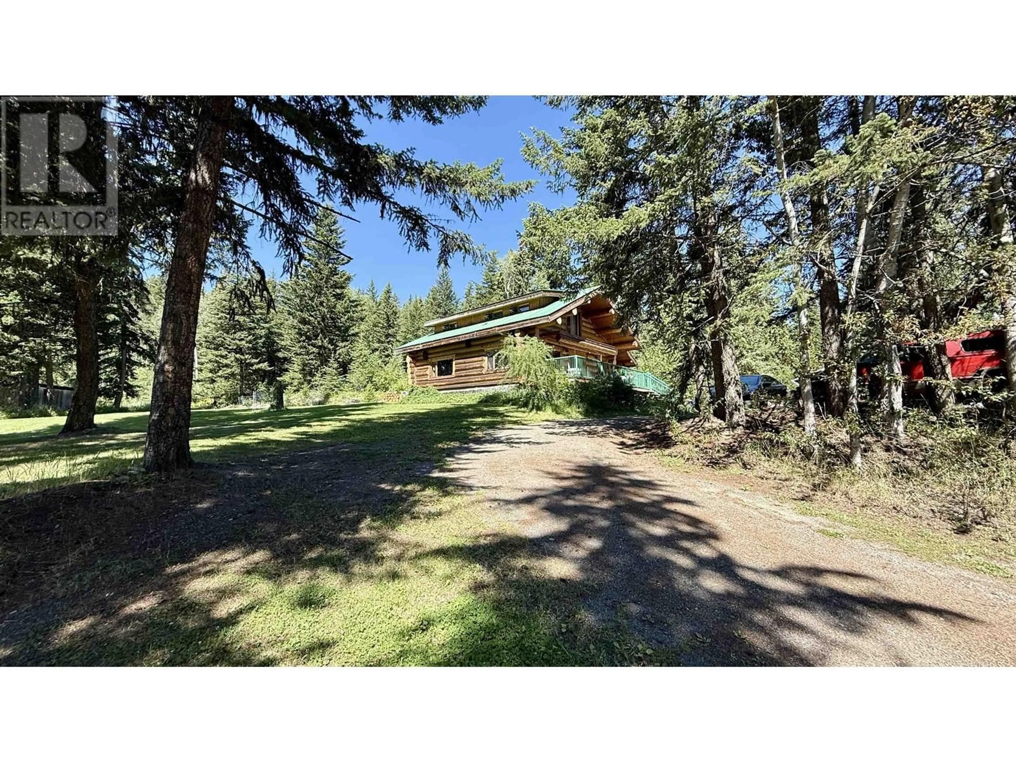 A pic from outside/outdoor area/front of a property/back of a property/a pic from drone, forest/trees view for 7538 BRIDGE LAKE BUSINESS RTE, Bridge Lake British Columbia V0K1E0