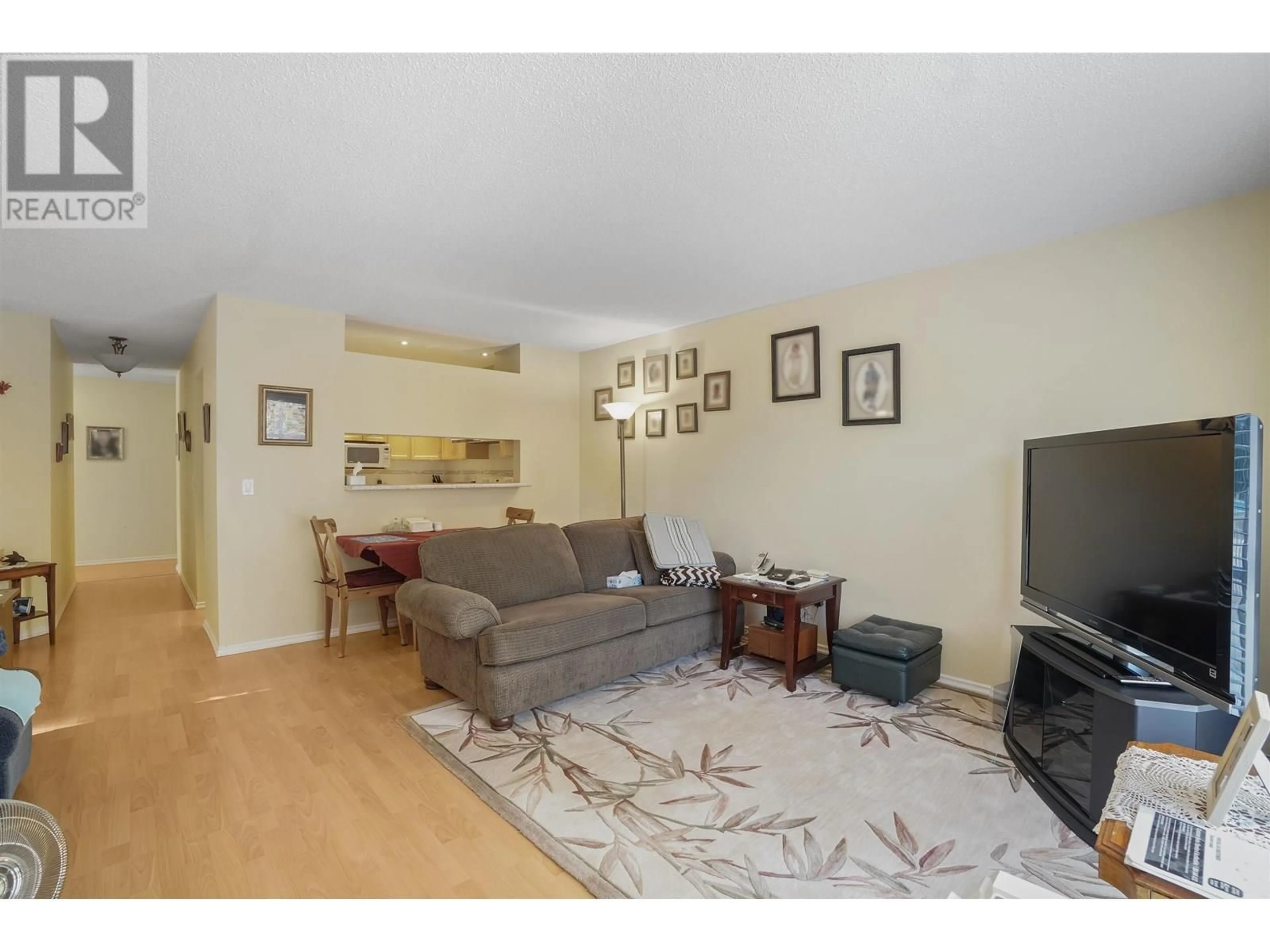 Living room with furniture, wood/laminate floor for 105 - 7580 MINORU BOULEVARD, Richmond British Columbia V6Y1Z5