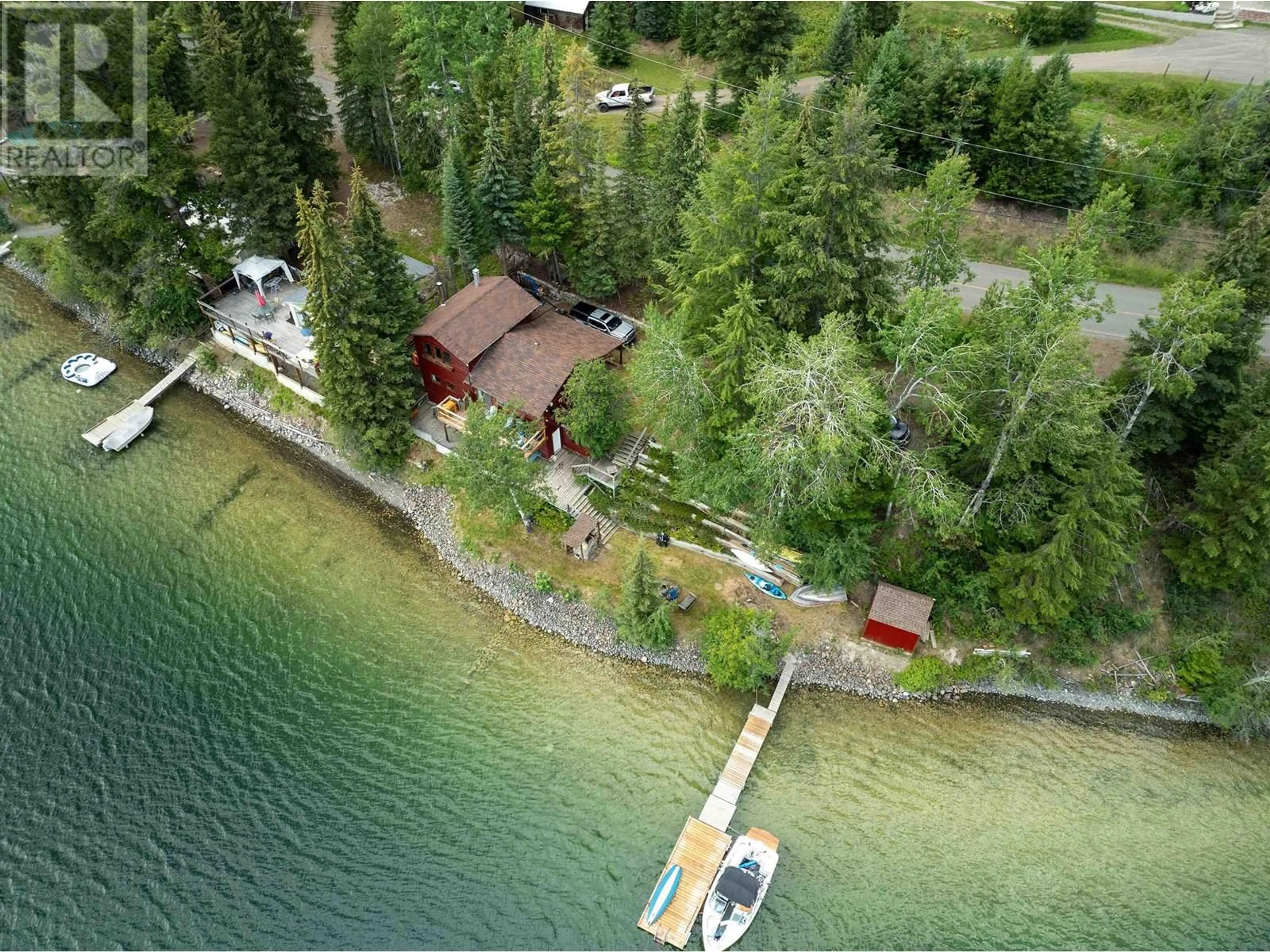 A pic from outside/outdoor area/front of a property/back of a property/a pic from drone, water/lake/river/ocean view for 8072 BRIDGE LAKE NORTH ROAD, Bridge Lake British Columbia V0K1X2