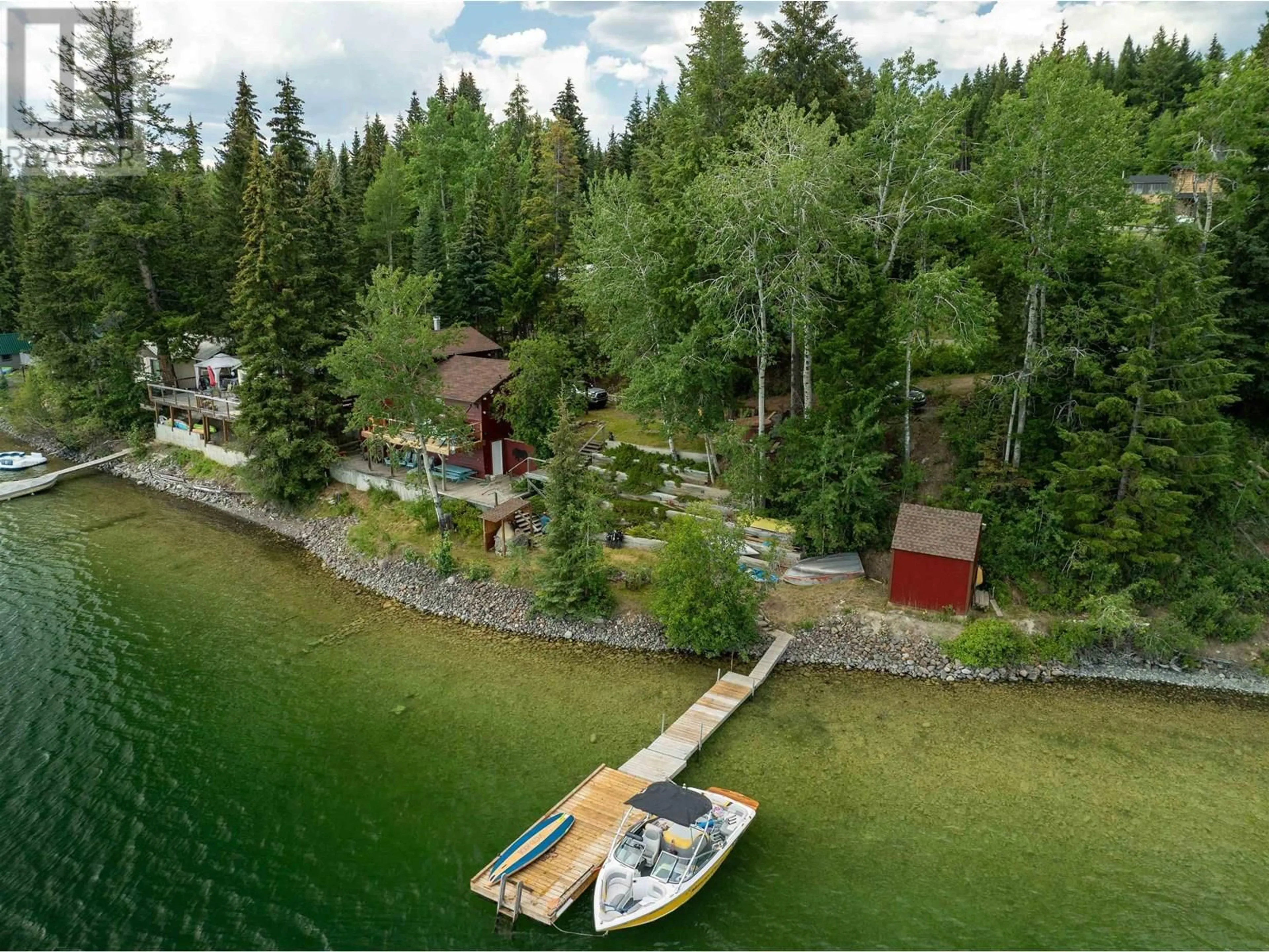 A pic from outside/outdoor area/front of a property/back of a property/a pic from drone, water/lake/river/ocean view for 8072 BRIDGE LAKE NORTH ROAD, Bridge Lake British Columbia V0K1X2