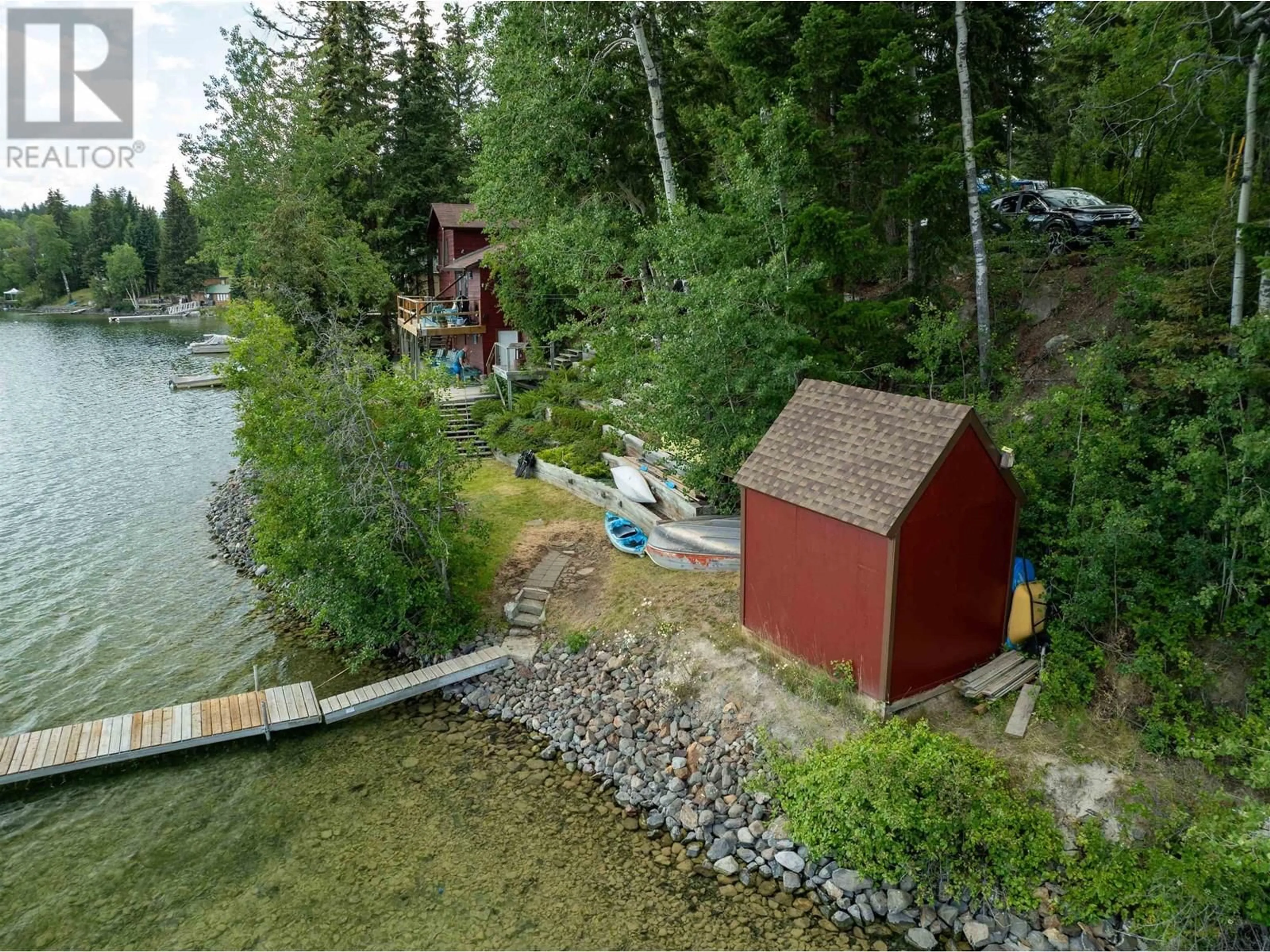 A pic from outside/outdoor area/front of a property/back of a property/a pic from drone, water/lake/river/ocean view for 8072 BRIDGE LAKE NORTH ROAD, Bridge Lake British Columbia V0K1X2