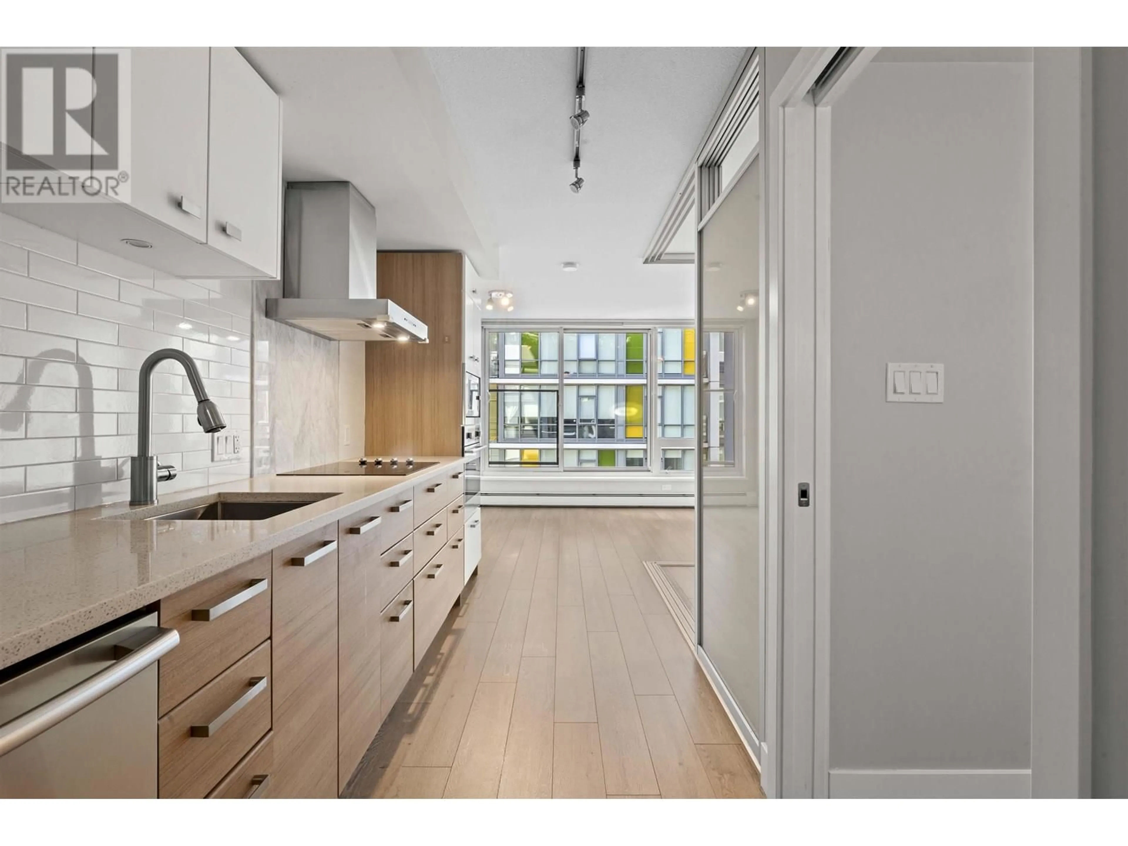 Open concept kitchen, unknown for 516 - 1783 MANITOBA STREET, Vancouver British Columbia V5Y0K1
