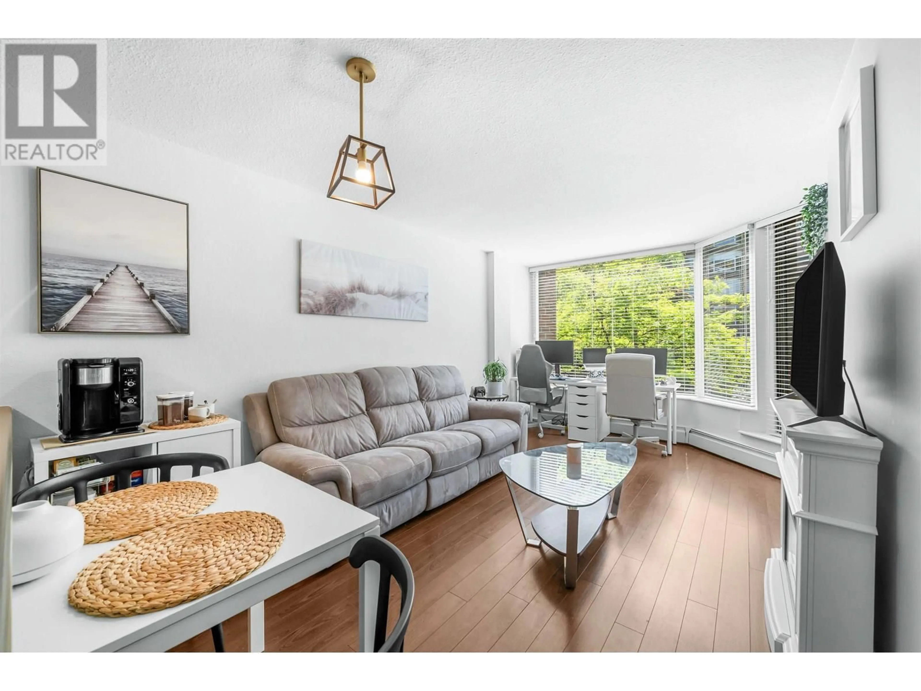 Living room with furniture, wood/laminate floor for 318 - 1330 BURRARD STREET, Vancouver British Columbia V6Z2B8