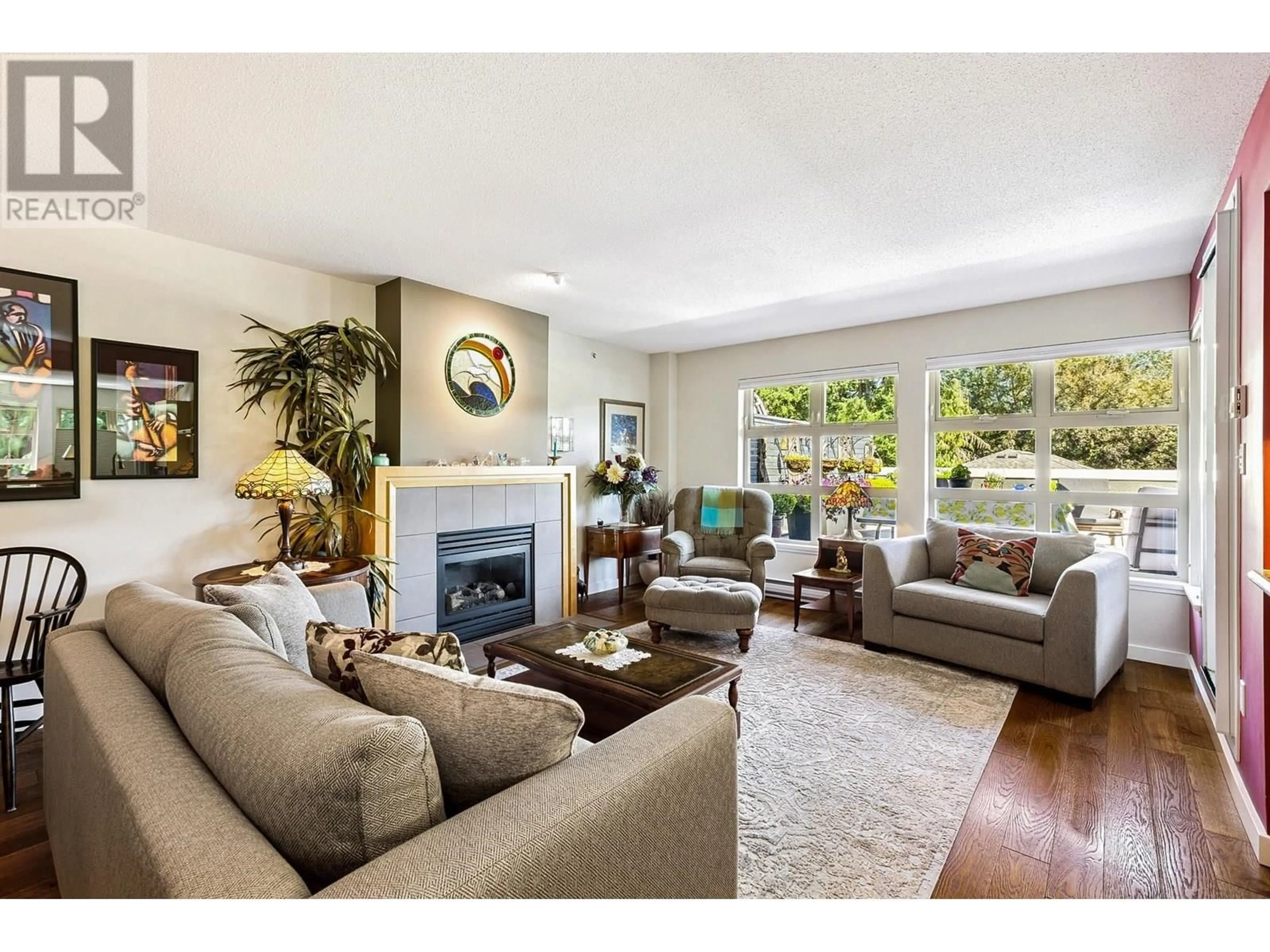 Living room with furniture, unknown for 303 - 3750 EDGEMONT BOULEVARD, North Vancouver British Columbia V7R2P8