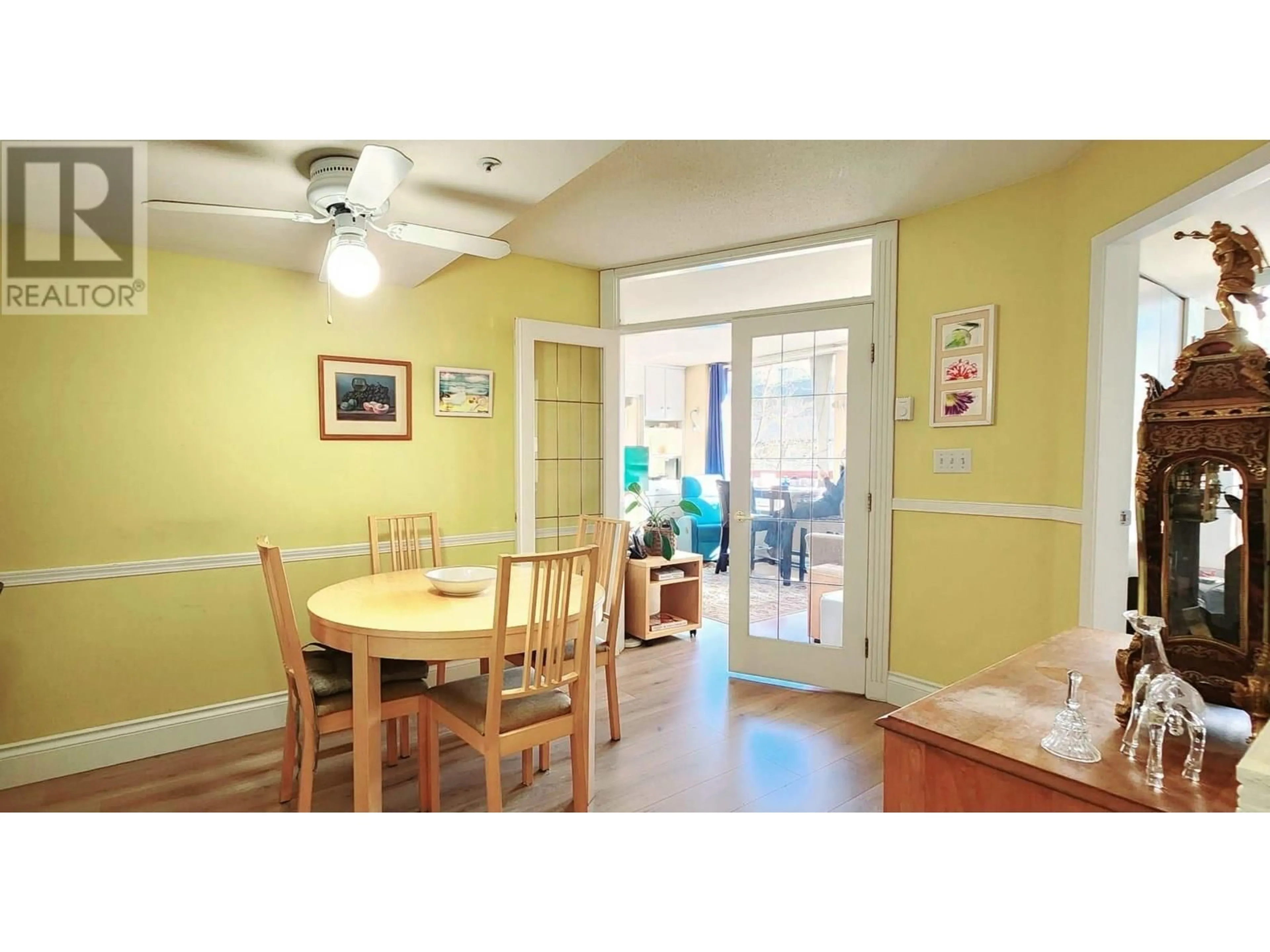 Dining room, wood/laminate floor for 208 - 811 HELMCKEN STREET, Vancouver British Columbia V6Z1B1